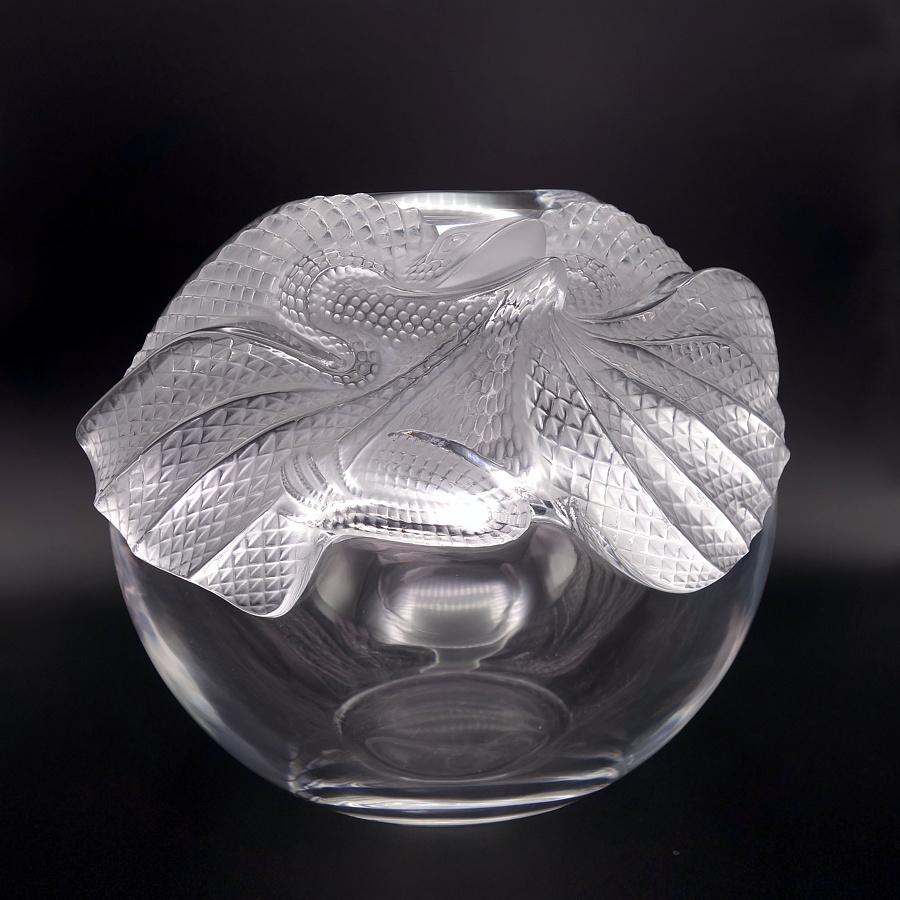 Offering this rare, signed Lalique 