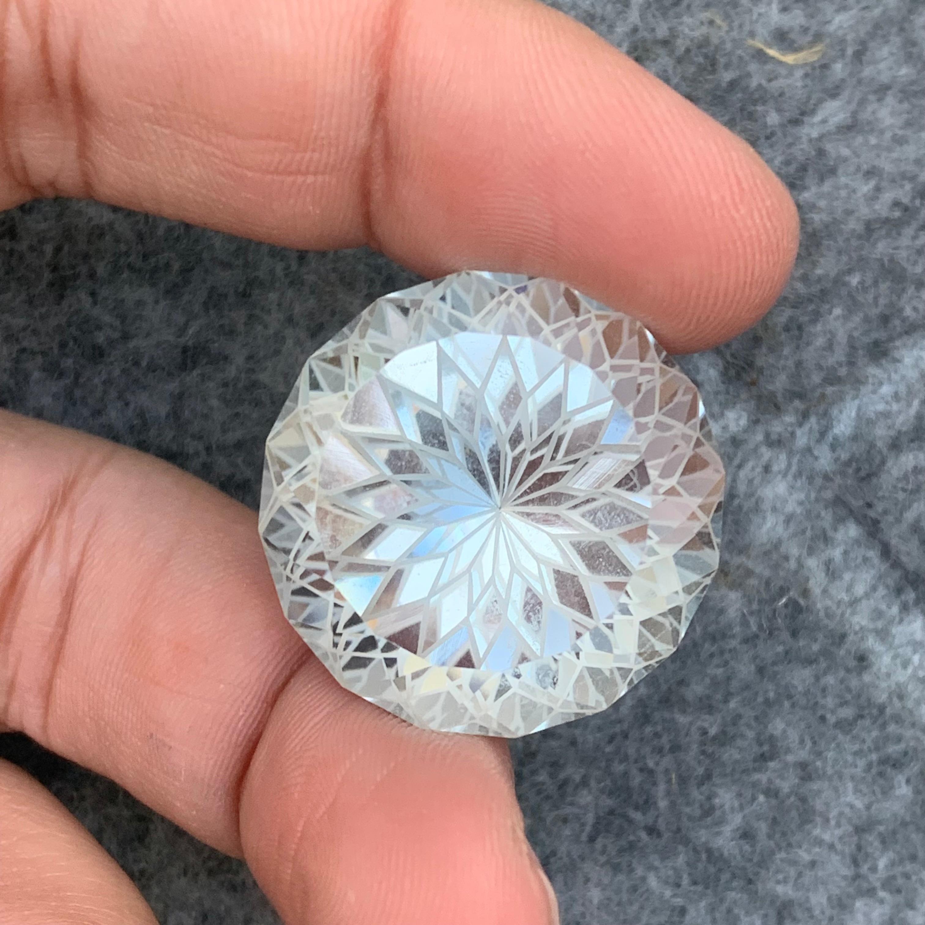 Loose Crystal Quartz
Weight : 68.60 Carats
Dimensions : 26x26x19 Mm
Origin : Brazil
Clarity : AAA Eye Clean
Shape: Round Shape
Facet: Flower Cut 
Certificate: On Demand
Treatment: Non
Color: Colorless
Quartz crystal is a power stone that's prized as