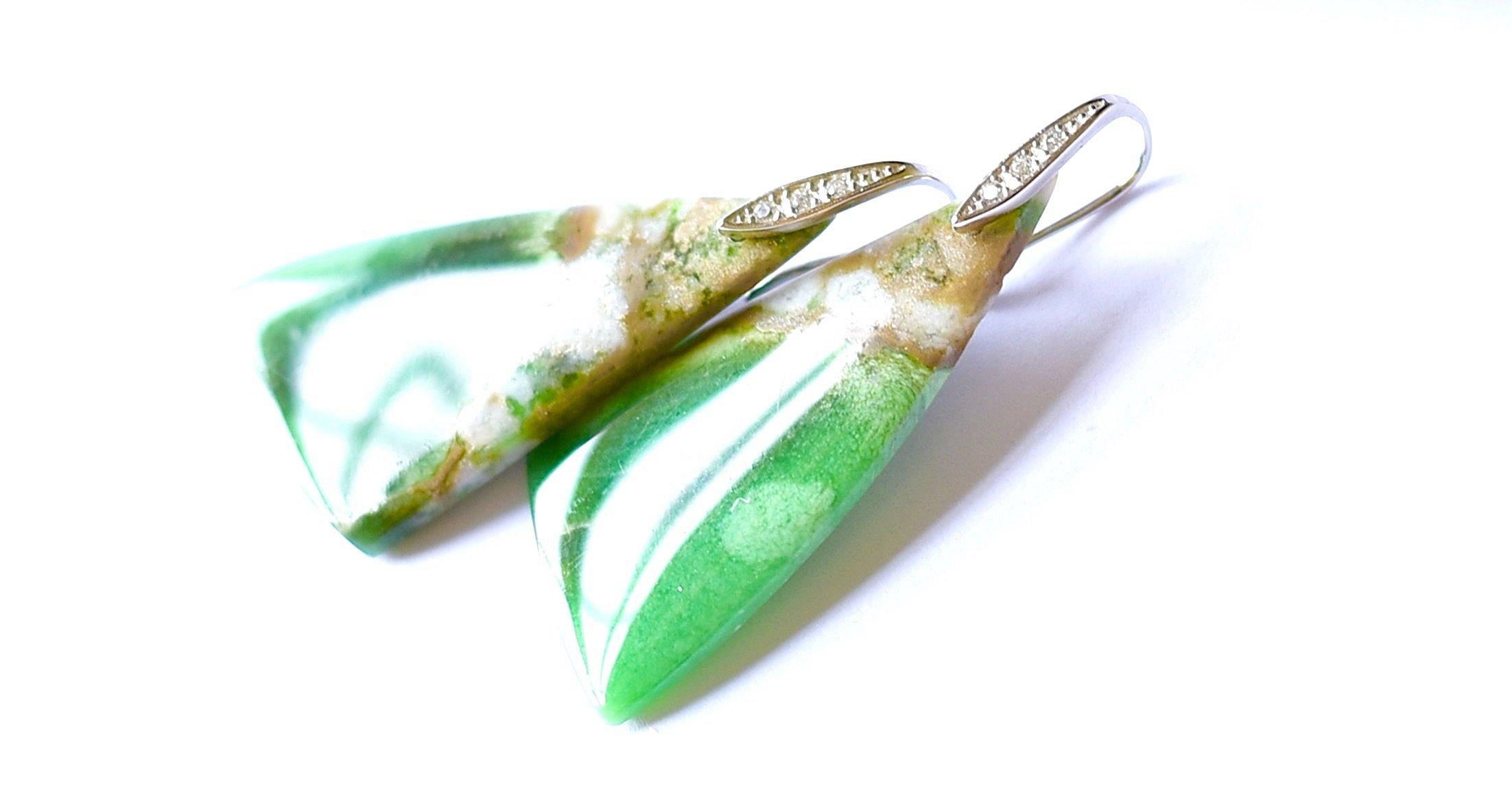 A gorgeous pair of earrings in Lucin Variscite in a beautiful creamy white and green color. Earrings hooks are small and shiny and finish an elegant look! All eyes will be on you! 