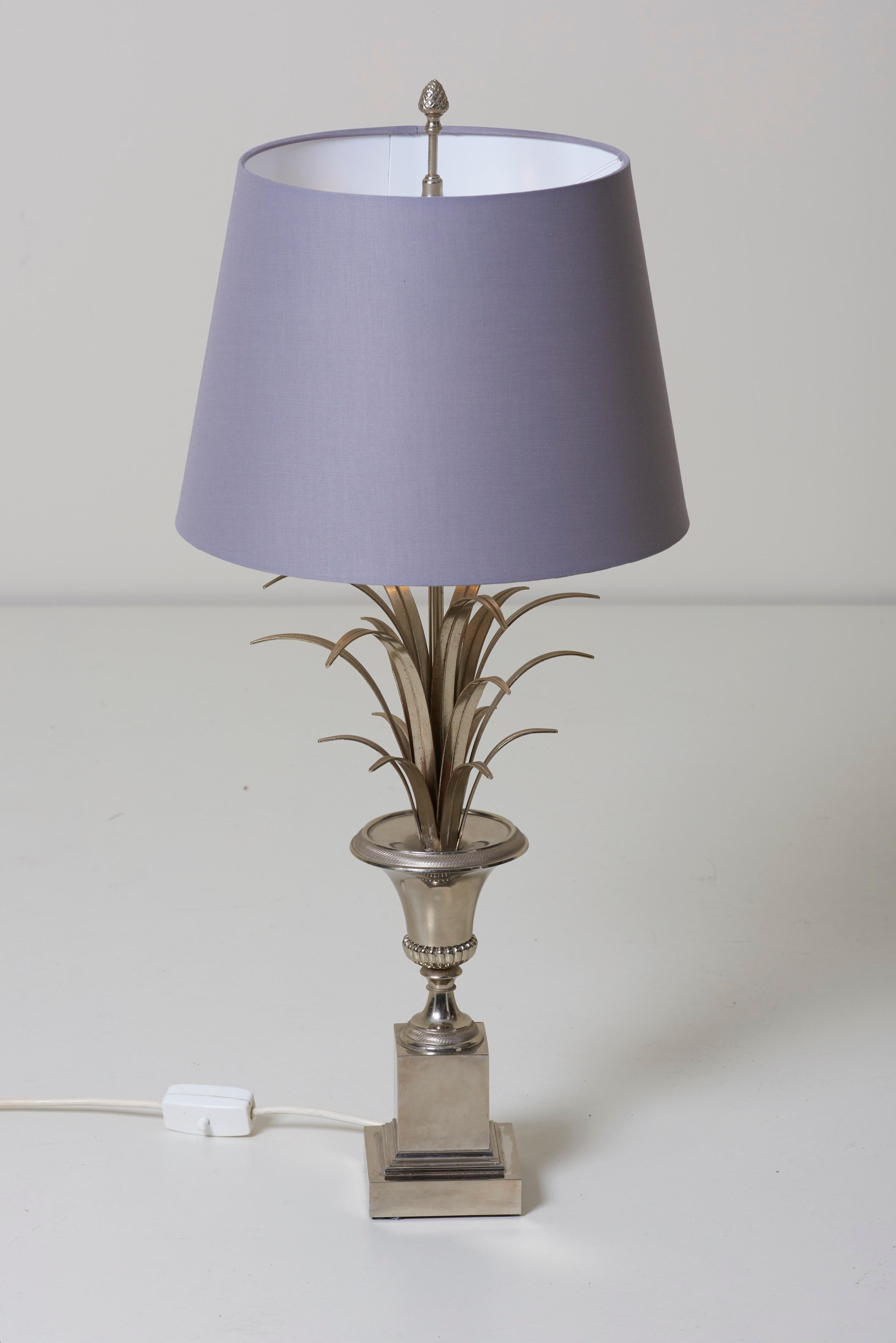 Wonderful, huge Maison Charles table lamp in chrome. The lamps are in a good vintage condition. The lampshade is only for purpose of illustration and doesn’t belong to the lamp.