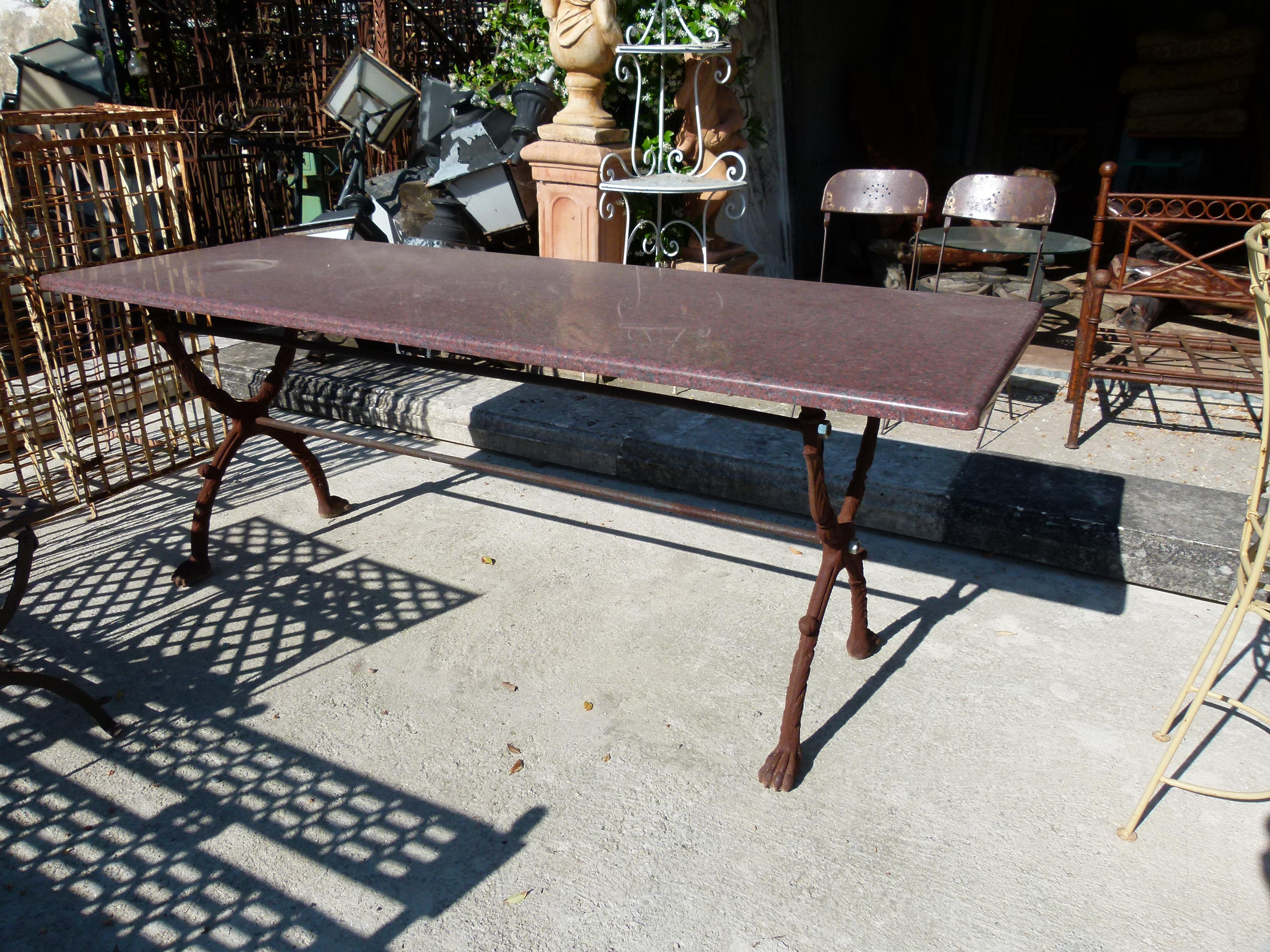 Huge marble and cast iron outdoor dining table
A red/ black color marble top table with rounded corners and cast iron feet with carved decoration. A perfect garden/ terrace table for your to gather 12 to 16 diners.