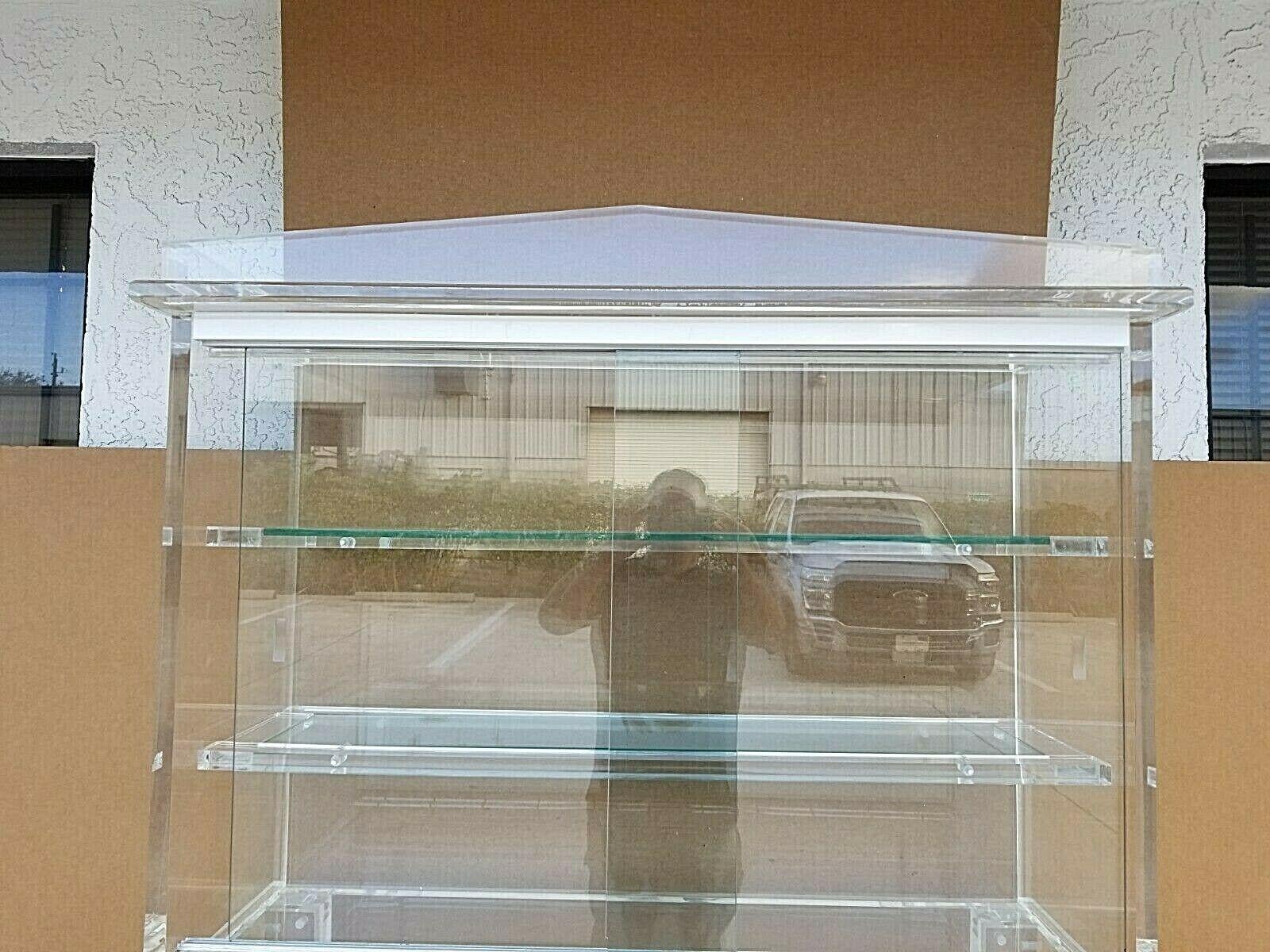 glass etagere with doors