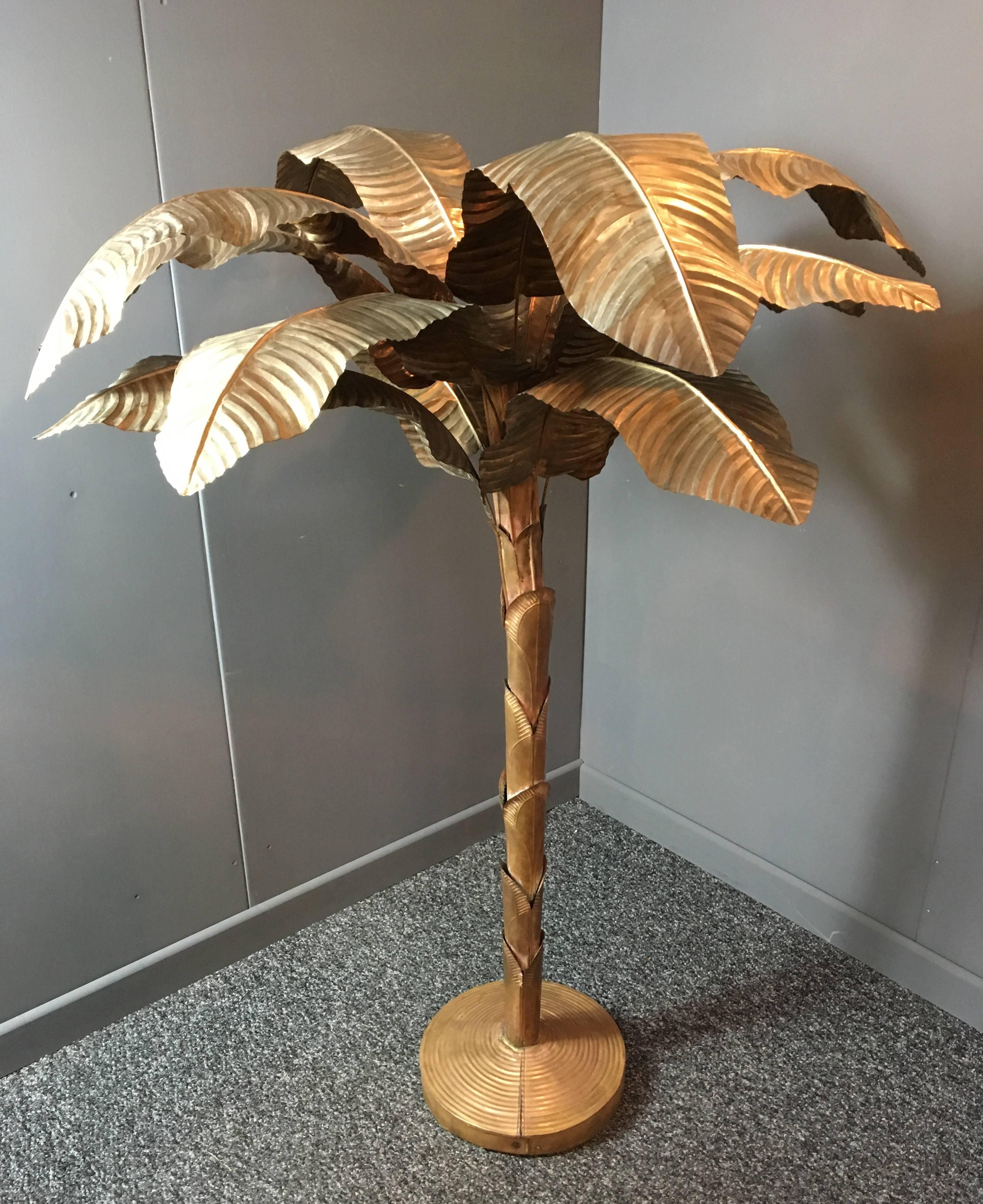 Huge brass and copper banana tree sculpture,

midcentury, circa 1960s.

France

Handcrafted leaves are fully removable and slot into the main stem of the tree

The stem has a natural slight bend to it as a banana tree would, this is a