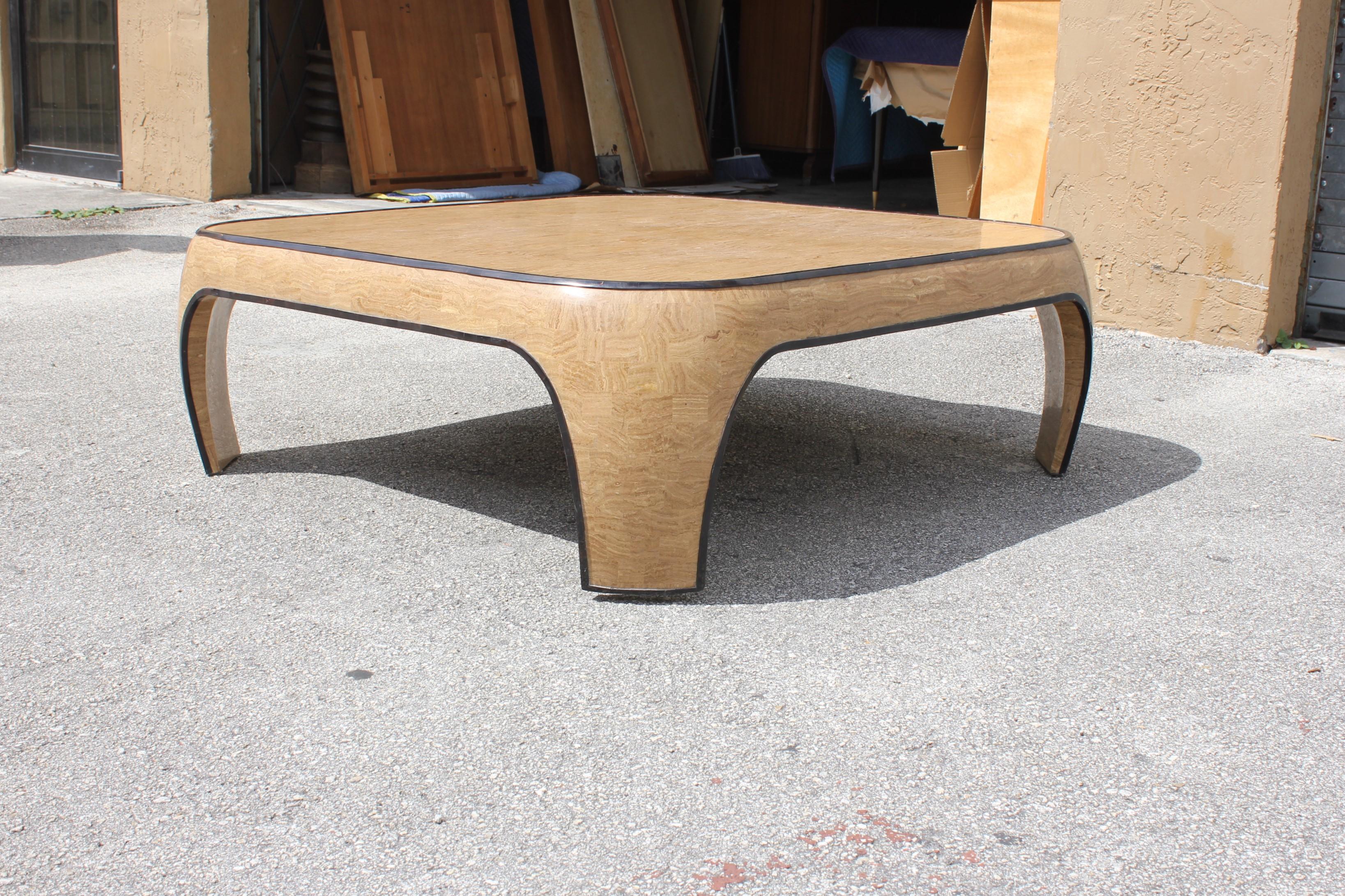 Huge Mid-Century Modern Maitland Smith tessellated stone coffee table. Made in the 1970s. The coffee table is beautiful with two color of tessellated stone. Brown color and black color stone frame, the table are in very good condition. Dimensions: