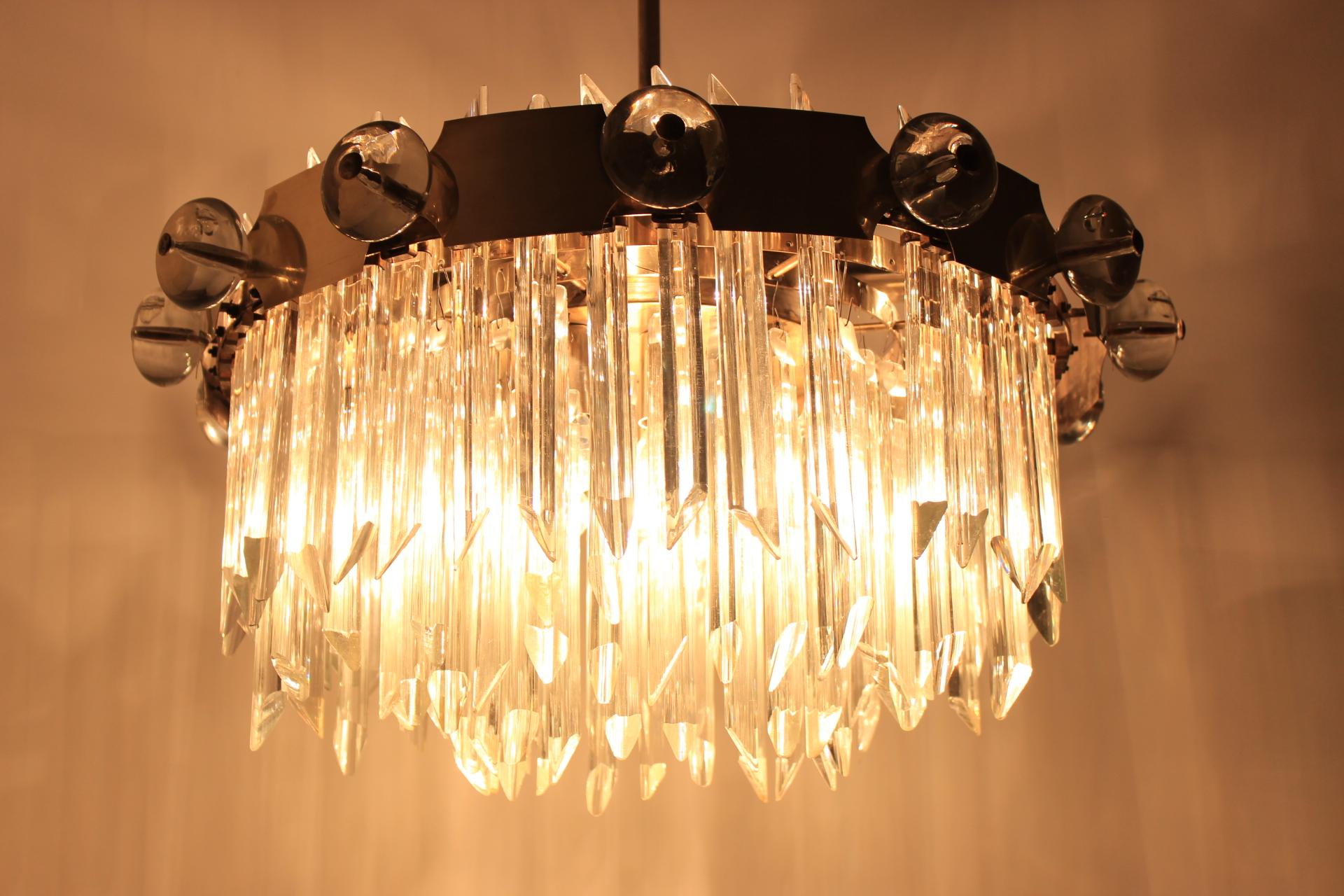 - Huge chandelier 
- Mid Century
- Very representative 
- Amazing style of lighting
- For 14 bulbs / 14 flaming
- Very much of pendants from crystal glass
- Several original pendants are missing, can be done if interested
- From the hotel in the