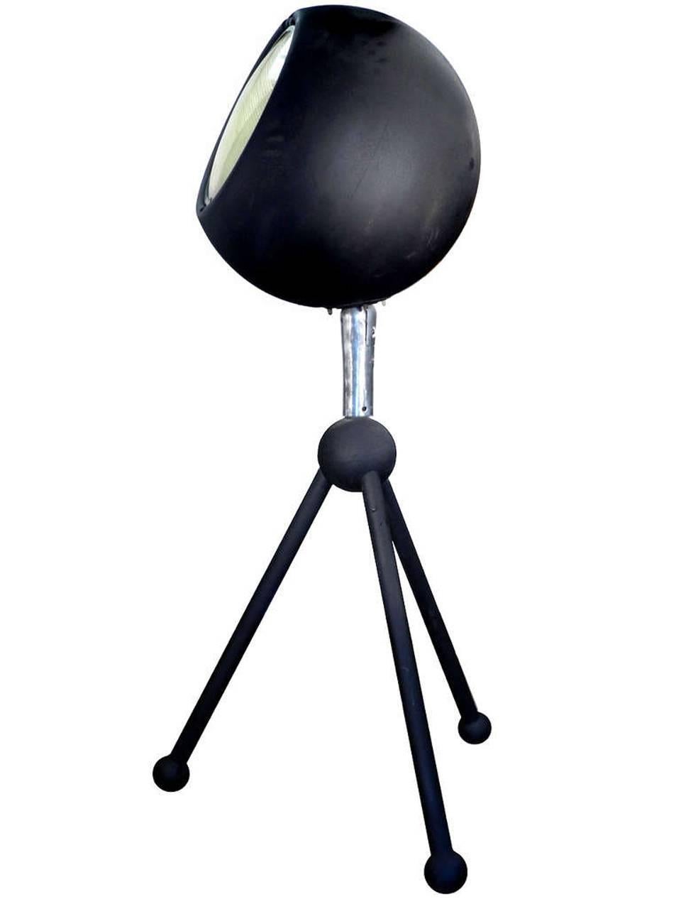 Don't underestimate the scale of this striking lamp. The top globe is a 24 inch sphere with an 18 inch diameter heavy glass lens. It has a bit of a Worlds Fair and Saarinen look to it. This would be an impressive signature piece for any size room.