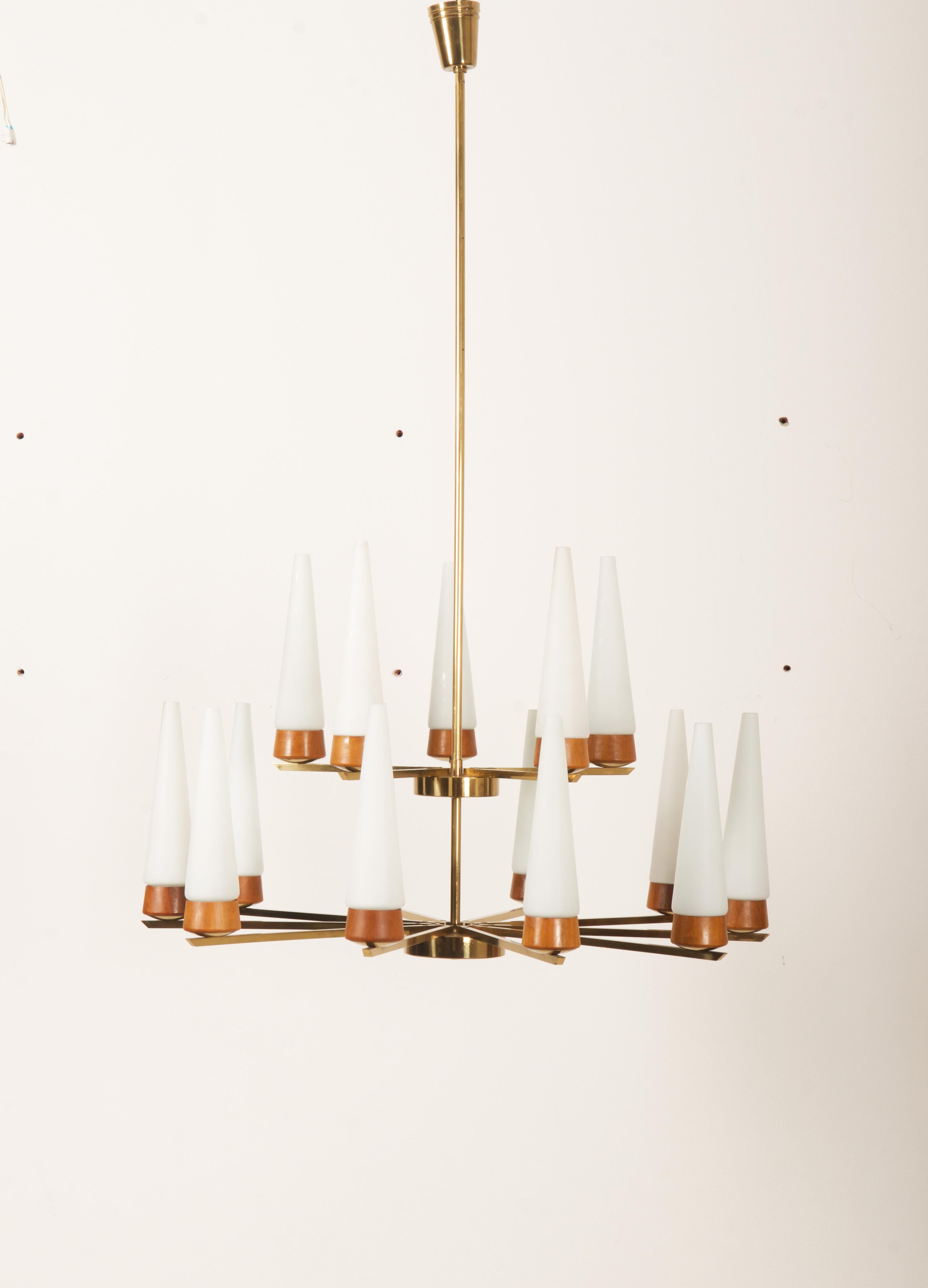 Brass construction with fifteen arms and opaline glass shades each fitted with E14 sockets. Made in Vienna by Rupert Nikoll in the late 1950s.
 