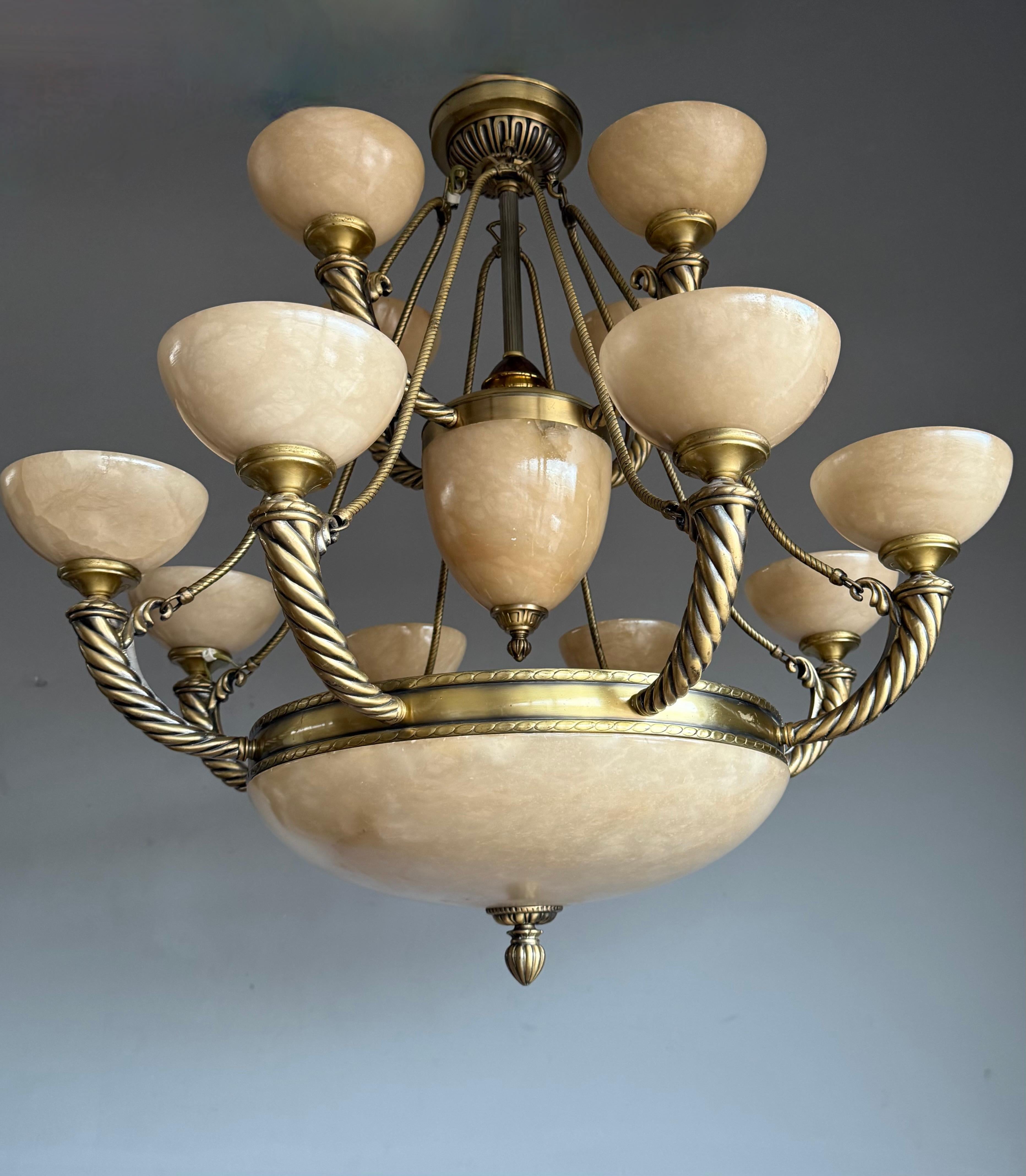 Majestic, work-of-art light fixture.

With 20th century lighting in general (and alabaster fixtures in particular) as one of our specialities, we were again amazed to find a completely unique (to us) and highly stylish, alabaster chandelier. This