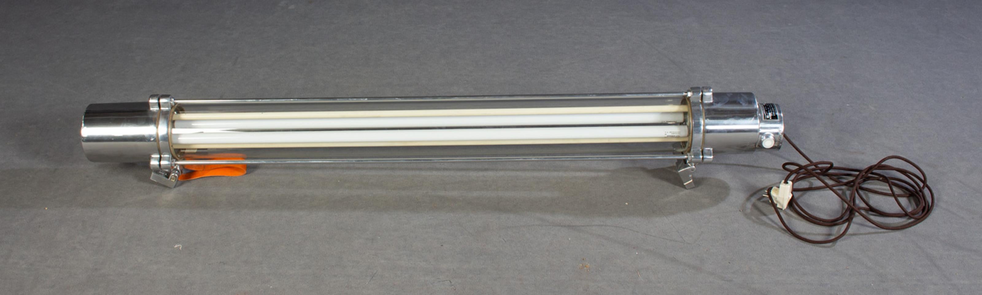 Midcentury industrial wall or flush mounted strip light cast aluminium with a glass cylinder, fluorescent tubes. High gloss / polished explosion-proof Industrial lamp, VEB Leuchtenbau Wittenberg, former Paul Mrosek KG Wittenberg, bunker lamp made in