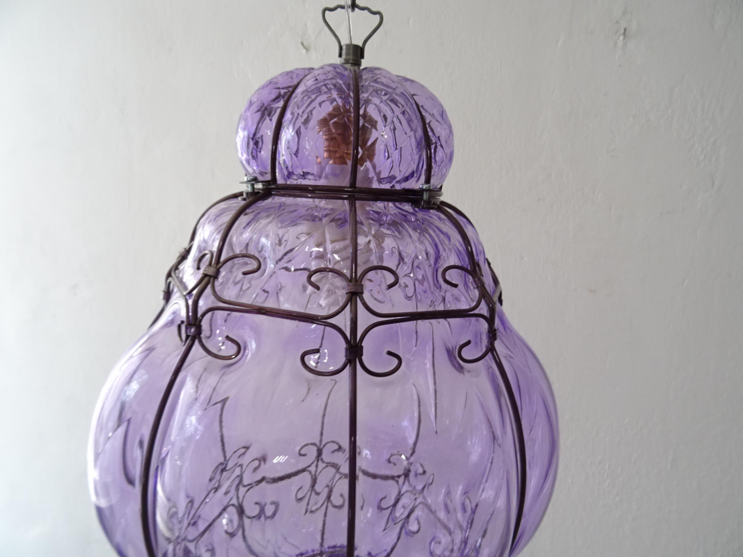 Housing one-light. Will be newly rewired with a certified UL US socket for the United States or appropriate socket for other countries and ready to hang. Rare big size and color of Lavender Murano blown glass in metal cage. Great craftsmanship.