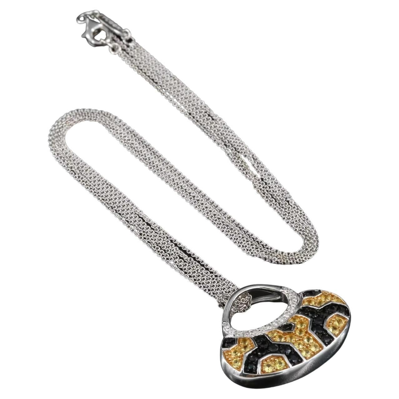 Designer Mirabelle Massive Pendant with Heavy 3 stand Tycoon chain 

NEW with tags, Tag Price $8750

18K White Gold (both pendant and chain)

Diamond and Sapphire, all natural and high quality 
        
Very Heavy, 15.1 grams 

Chain is 16.75