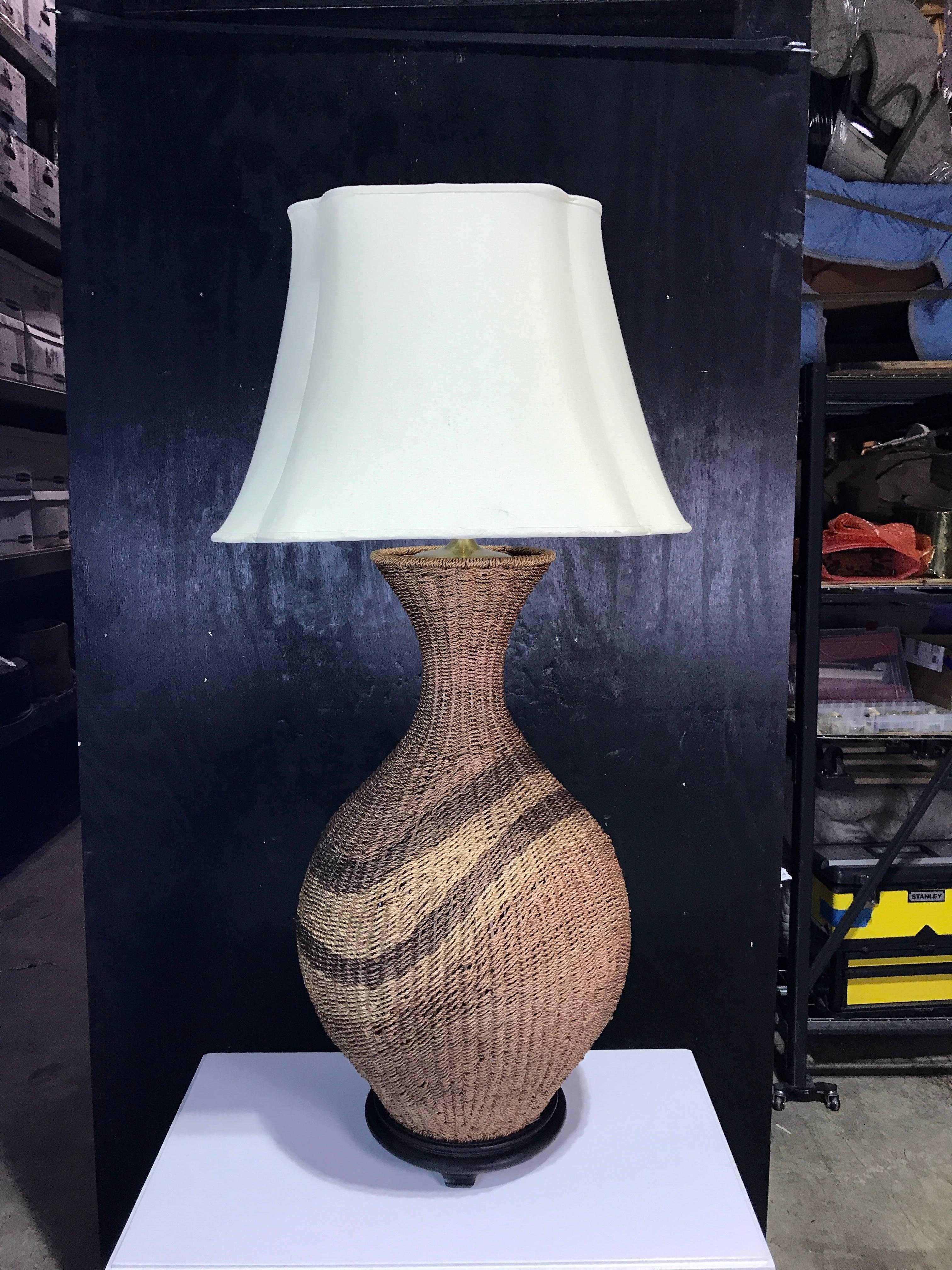 Huge mod polychromed rattan patterned lamp, new wiring.
Raised on an 11