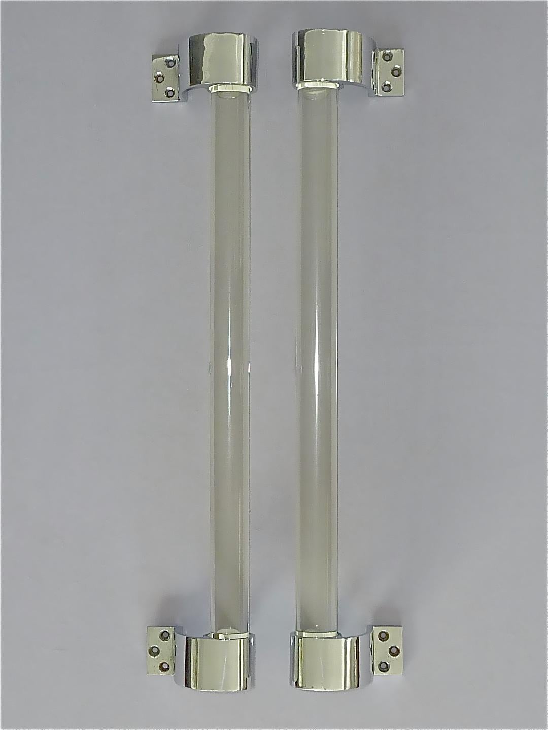 Beautiful pair of huge French modernist Art Deco door handles designed and executed in the 1920s to 1930s in France most probably by Jacques Adnet in cooperation with Baccarat France. Made of high quality the thick and heavy clear crystal glass rods