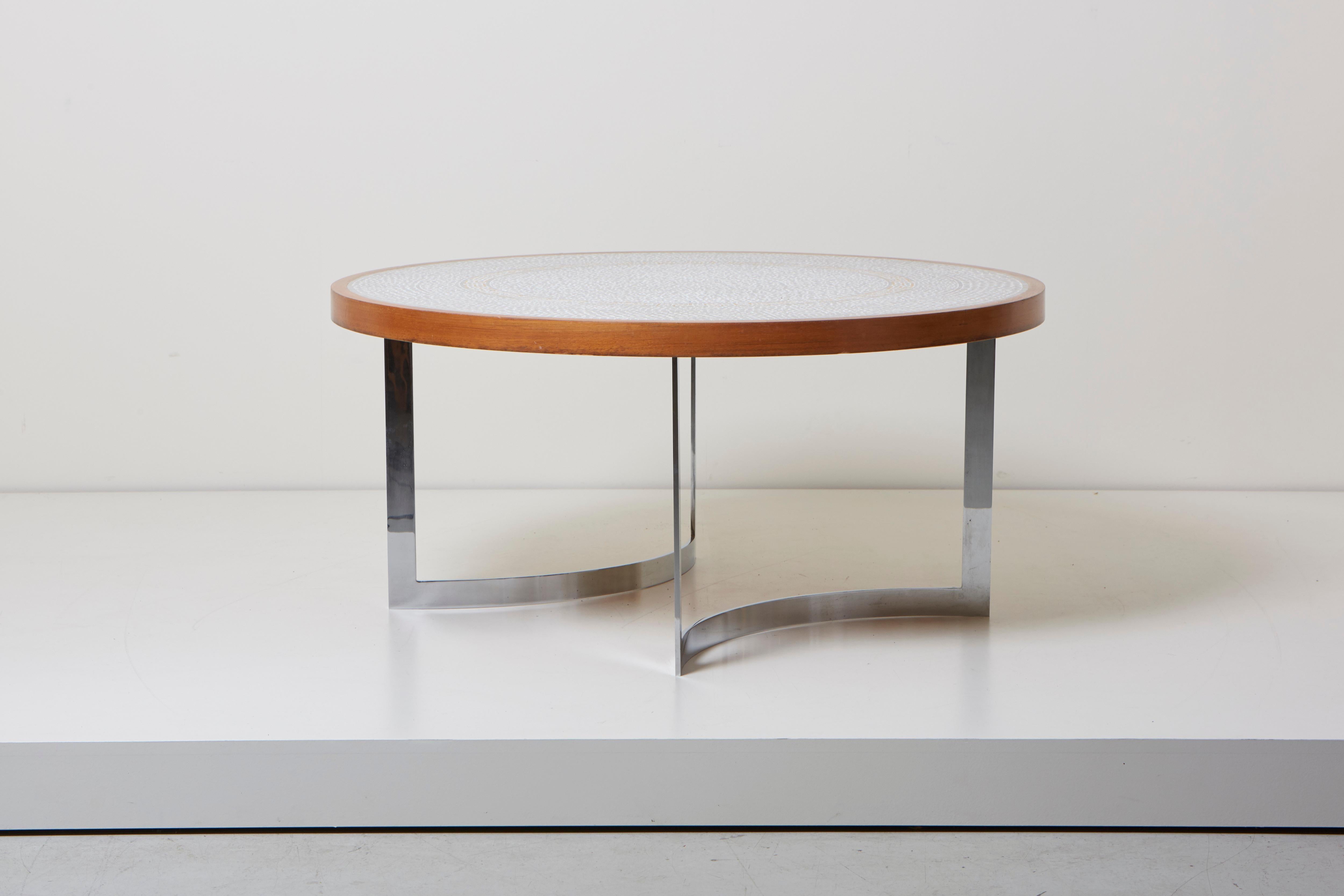Huge round coffee table designed by the German designer Berthold Müller, Germany, 1967.
The table has chrome legs and a walnut frame. The top has white ceramic stones combined with round pattern.
A great eyecatcher for a modern, antique, midcentury