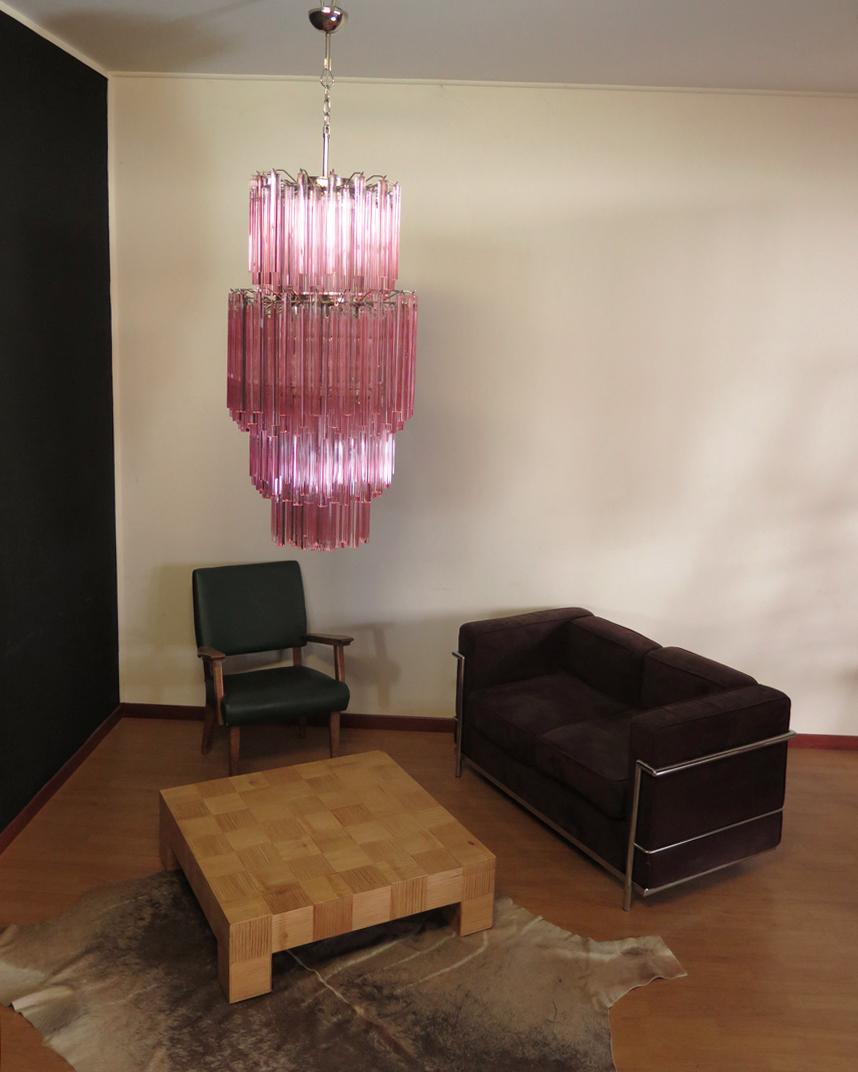 Fantastic vintage Murano chandelier made by 242 Murano crystal pink prism (TRIEDRI) on four levels in a nickel metal frame. The glasses have two different sizes.
Period: 1990's
Dimensions: 68,70 inches height (200 cm) with chain; 55,10 inches