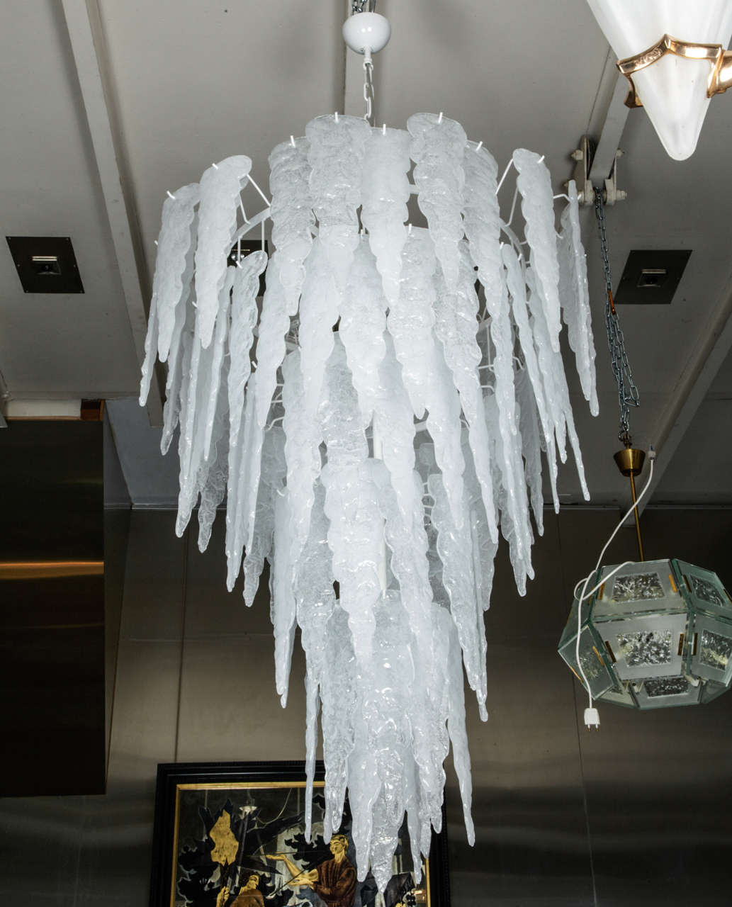 Great stalactite white snow glass chandelier.
Dimensions is provided without the chain.
