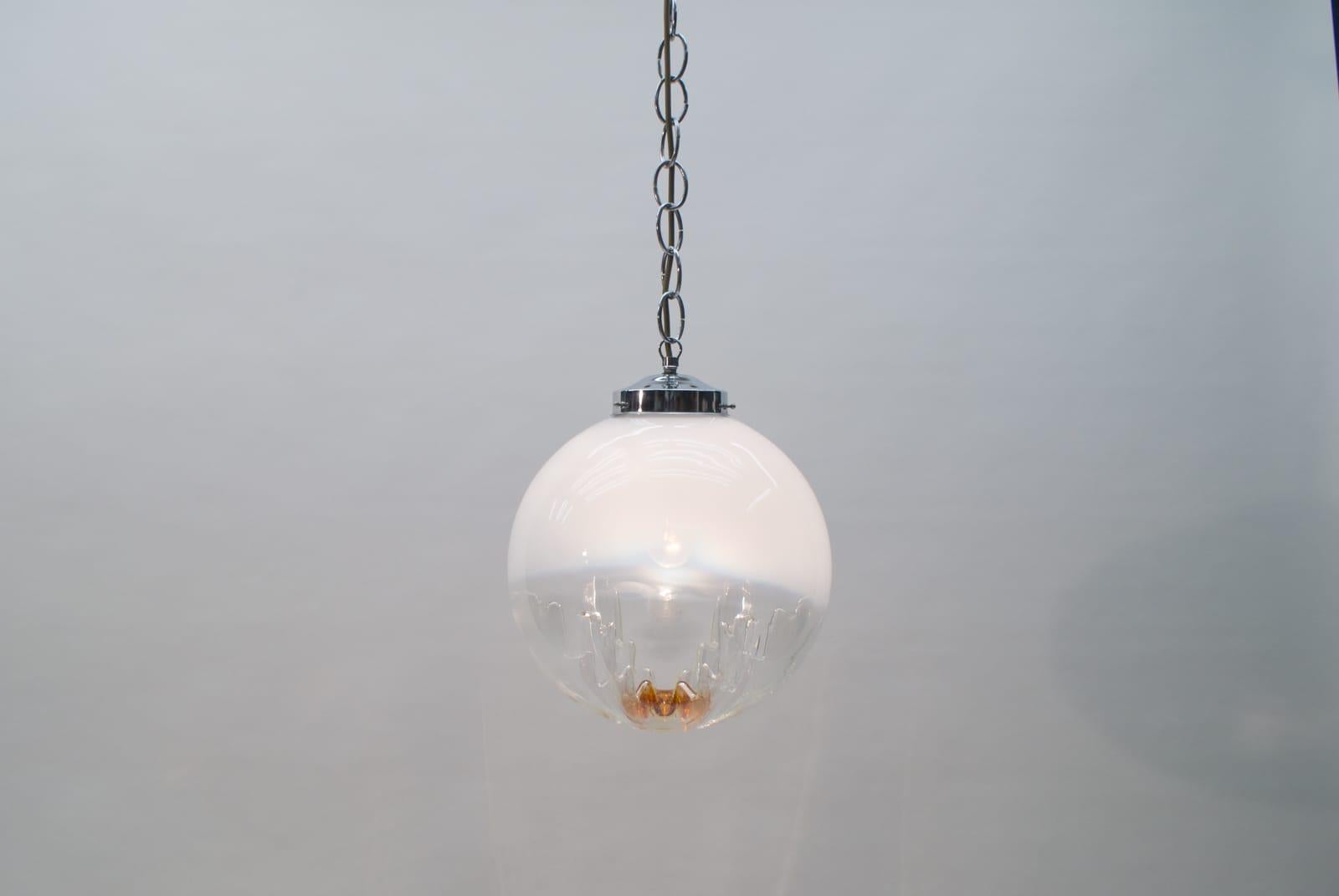 A beautiful glass lamp.
A touch of shadow play and transparency gives the lamp a wonderful lightness and elegance.
Designed in the 1960s in Italy for Mazzega.
The lamp need 1 x E27 Edison screw fit bulb. Its wired, in working condition and run