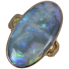 Huge Natural Black Opal Solitaire in 9 Carat Rose Gold Ring