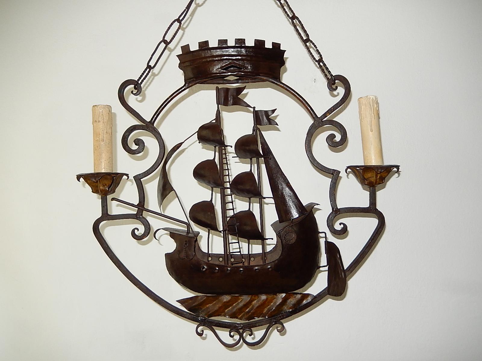 Huge wrought iron ship. Housing two-light. Will be rewired with appropriate sockets for country and ready to hang. Incredible details. Crown, flags, sails, rudder, latter, anchors, ropes and water. Original chains as well. Free priority UPS shipping