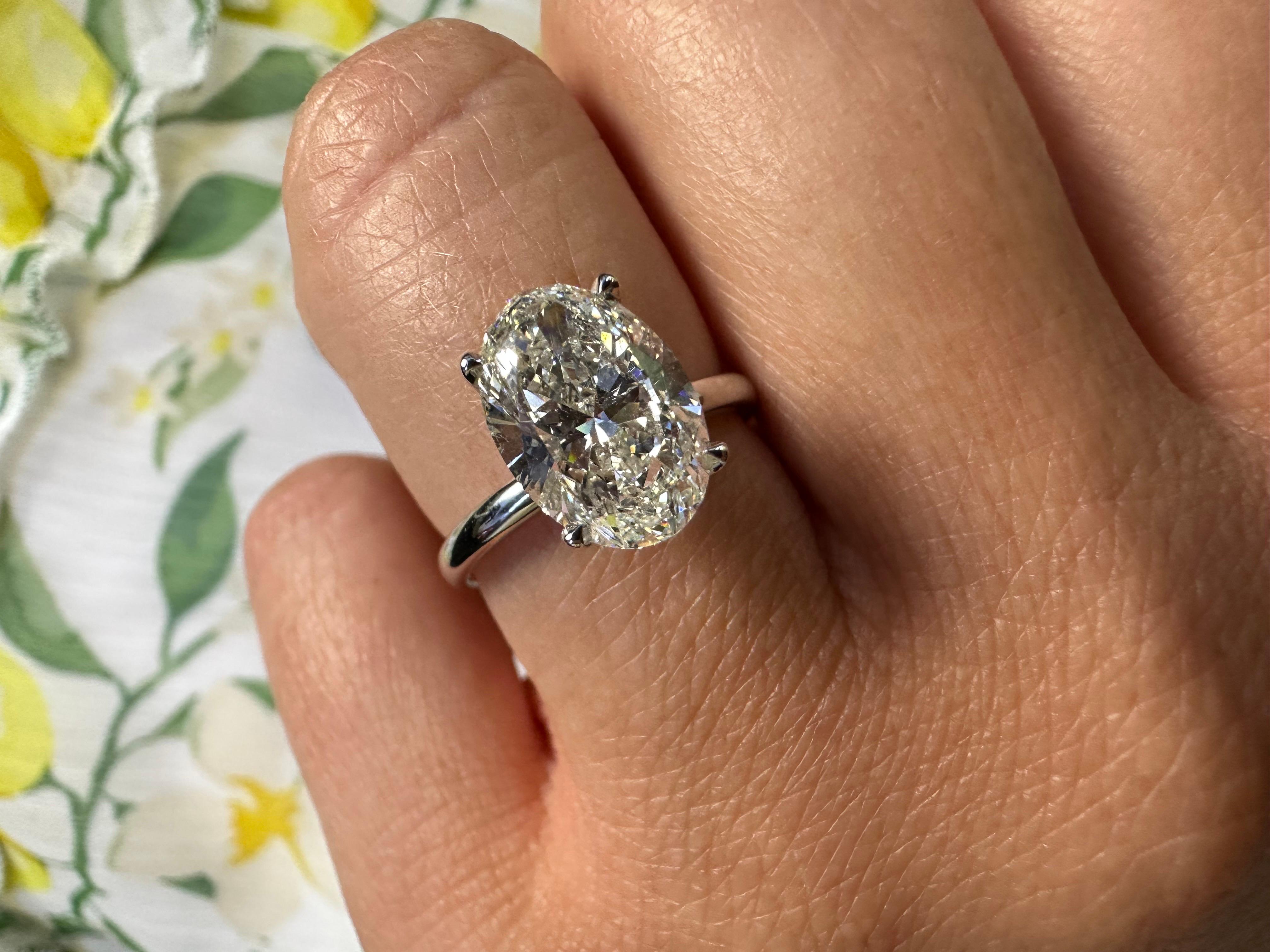 Huge Oval diamond engagement ring with unreal sparkle! GIA certified center diamond! The ring is made in 18KT white gold with classical undergallery of diamonds.

Metal Type: 18KT
Small diamonds:0.21ct
Natural Diamond(s): 
Color: I
Cut:Oval
