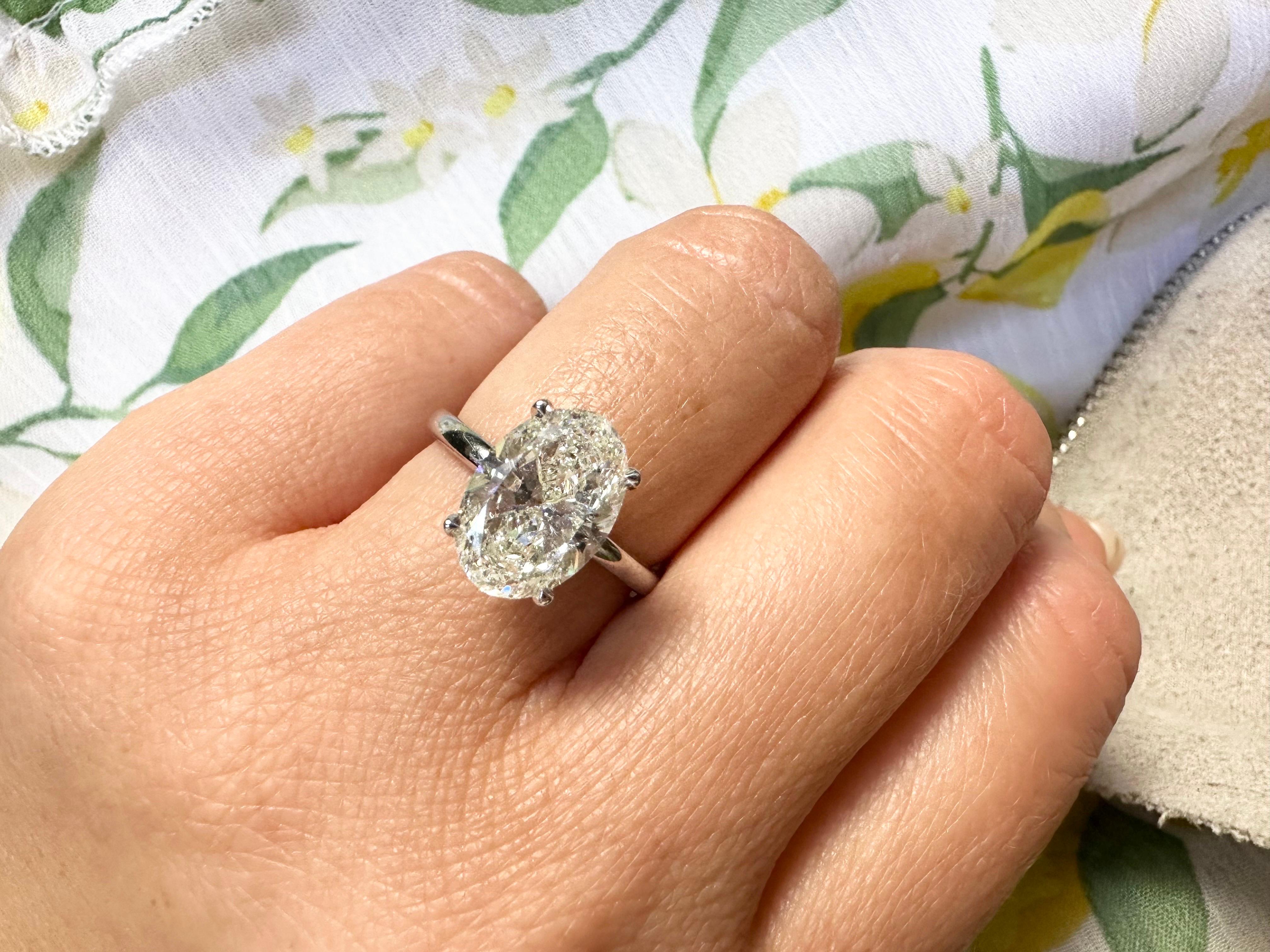 huge oval diamond ring