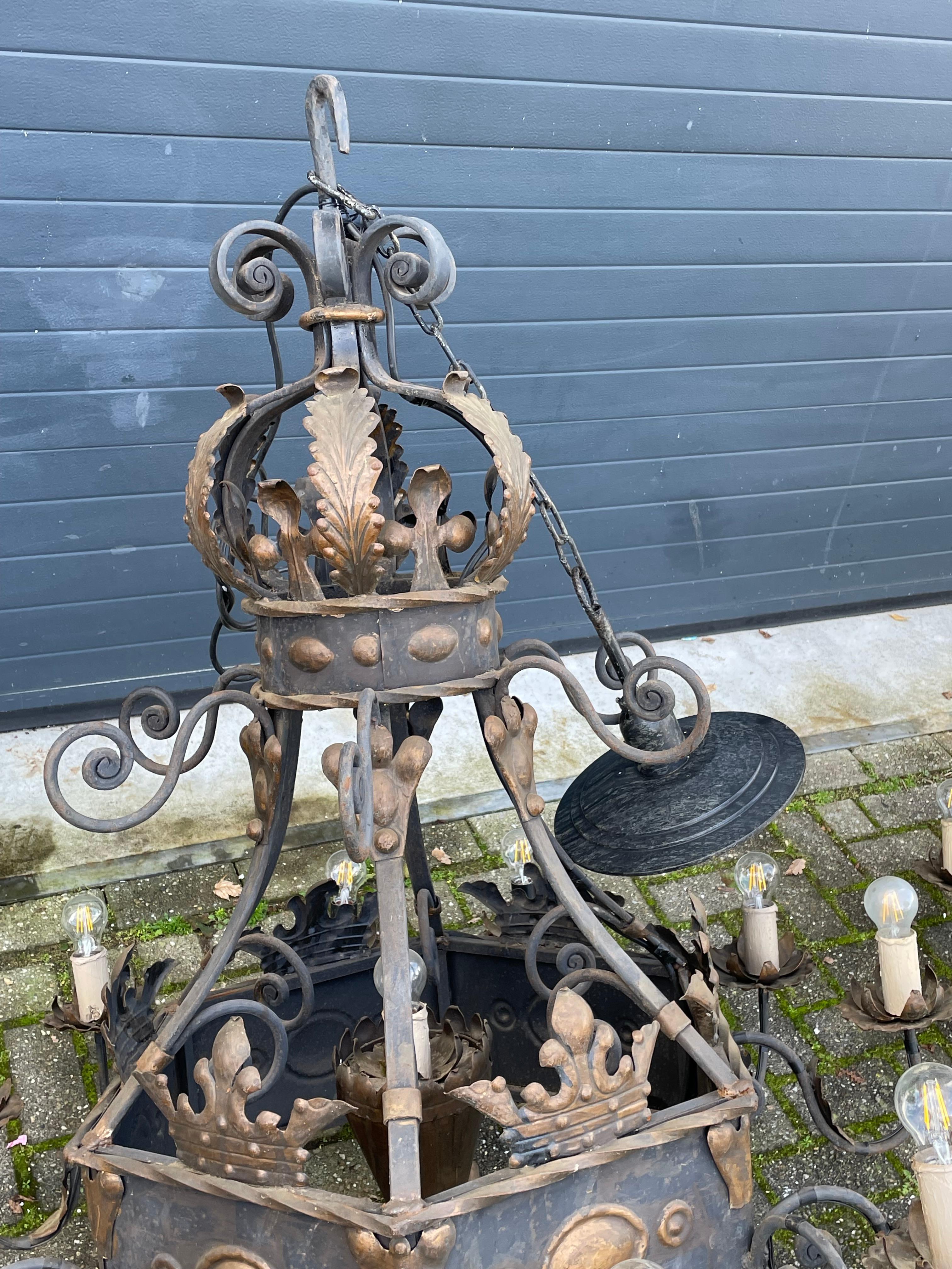 HUGE Pair of 13-Light Handforged Wrought Iron Castle Chandeliers w. Gothic Crown In Good Condition For Sale In Lisse, NL