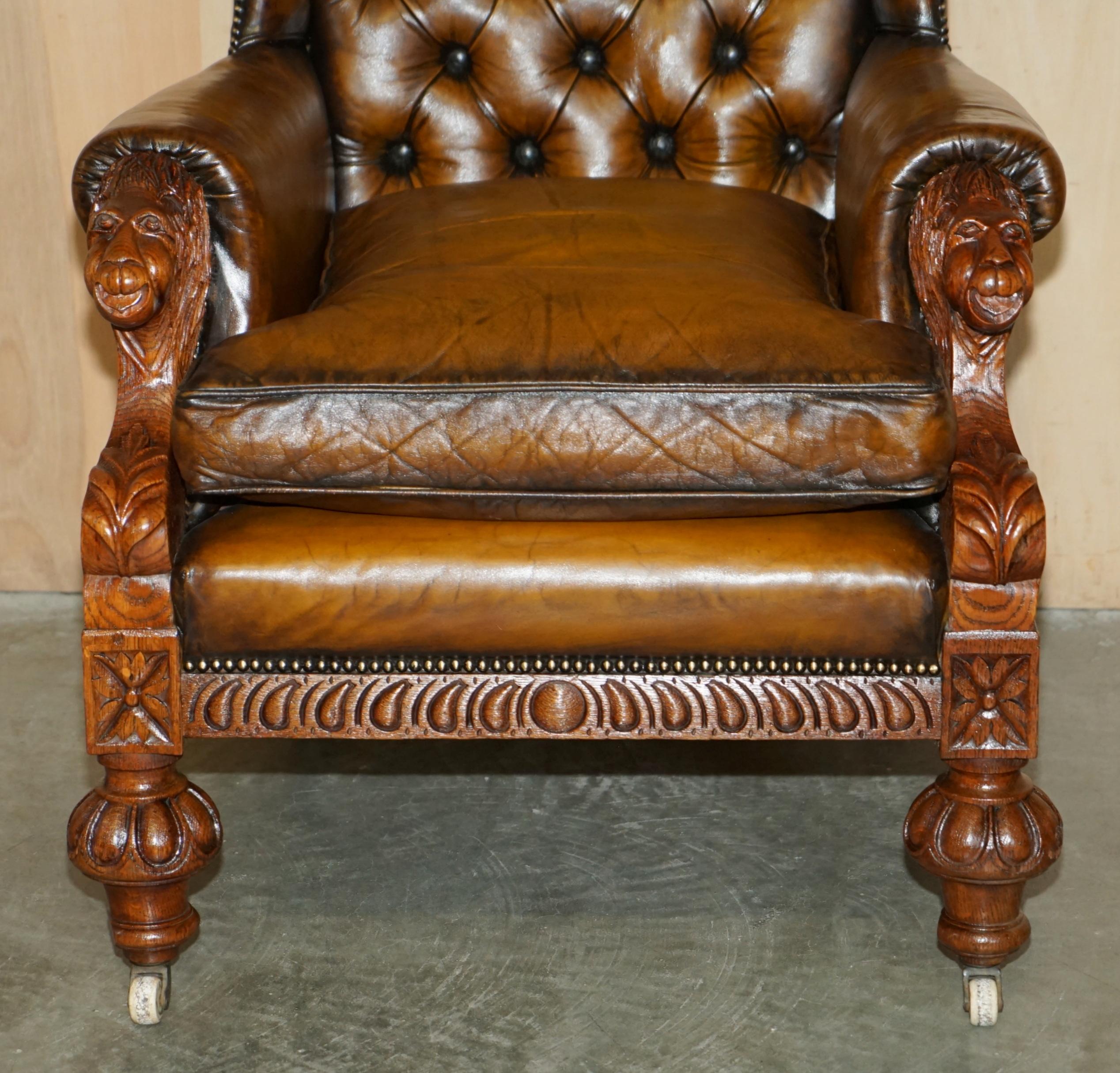 Leather HUGE PAIR OF ANTiQUE VICTORIAN LION CARVED CHESTERFIELD BROWN LEATHER ARMCHAIRS For Sale
