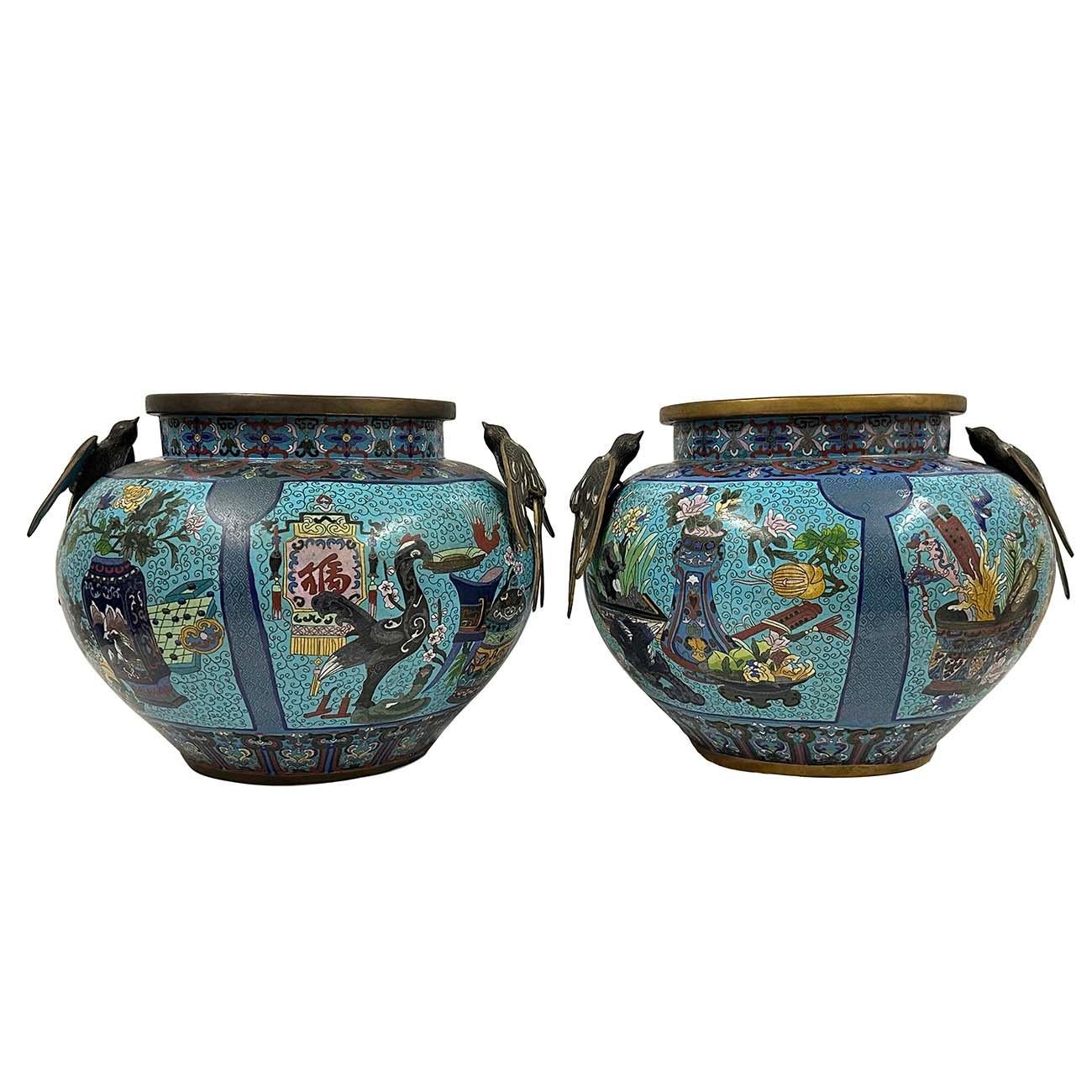 Look at this pair of magnificent Antique Chinese Cloisonne Pots. It shows very detailed hand craft works of cloisonne art - a lot of Chinese traditional folks art like Buddhas flower and lucky animals design around the pots. On the shoulder, there