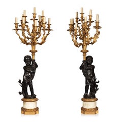 Huge pair of torcheres figurative, bronze and marble