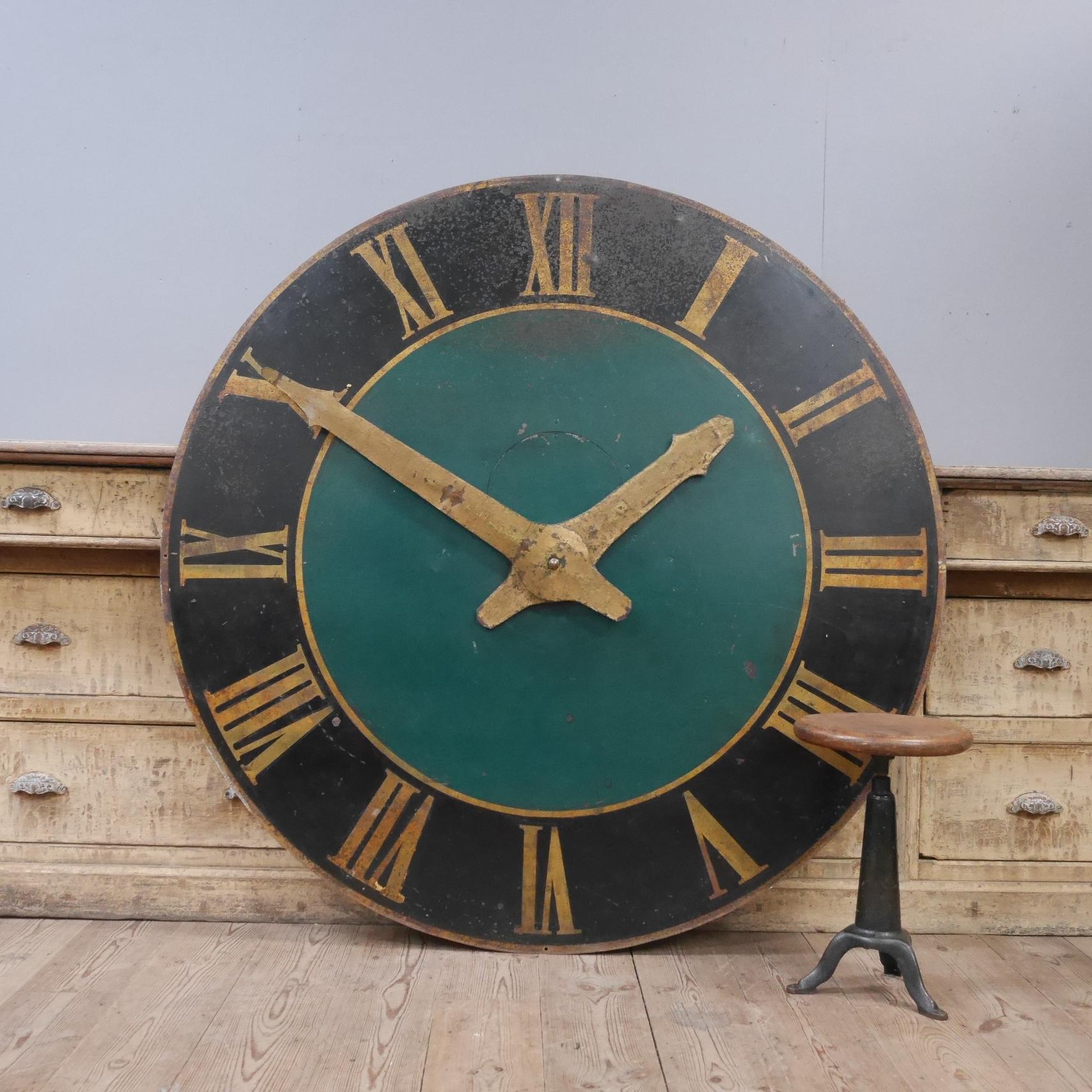A huge reclaimed Parisian tower clock face.
An exceptional & highly unusual example of great scale, in the original painted & gilded finish with just the right amount of wear. With a riveted ex-service hatch to the centre & retaining it's original