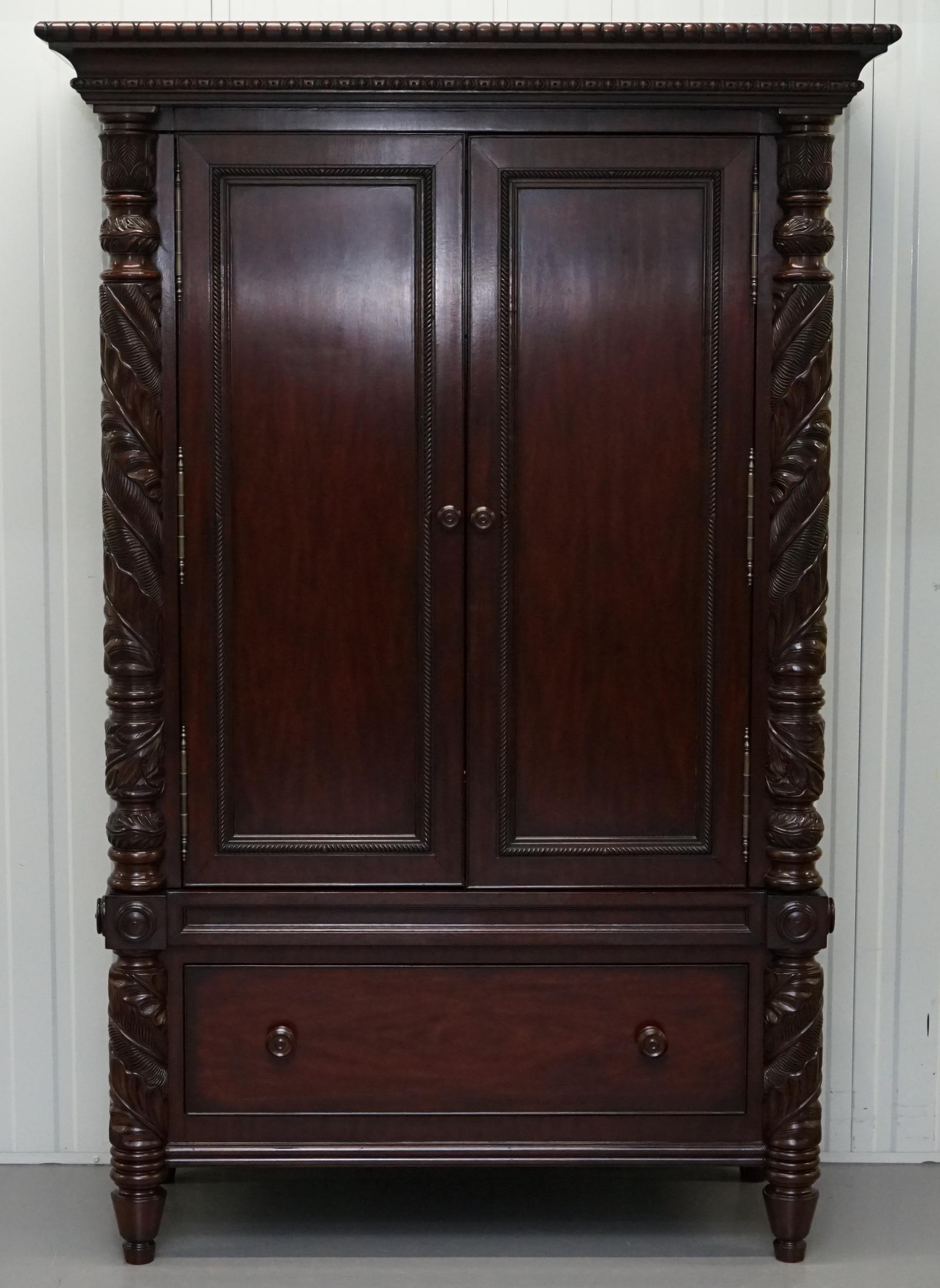 We are delighted to offer for sale this lovely very large and exceptionally heavy Ralph Lauren solid American Mahogany media cabinet.

A good looking and well made piece, it is as solid as they come, made and designed as a media cabinet so to hold