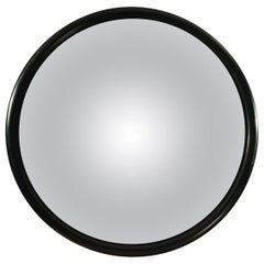 Grand miroir rond convexe avec contour en bois noir