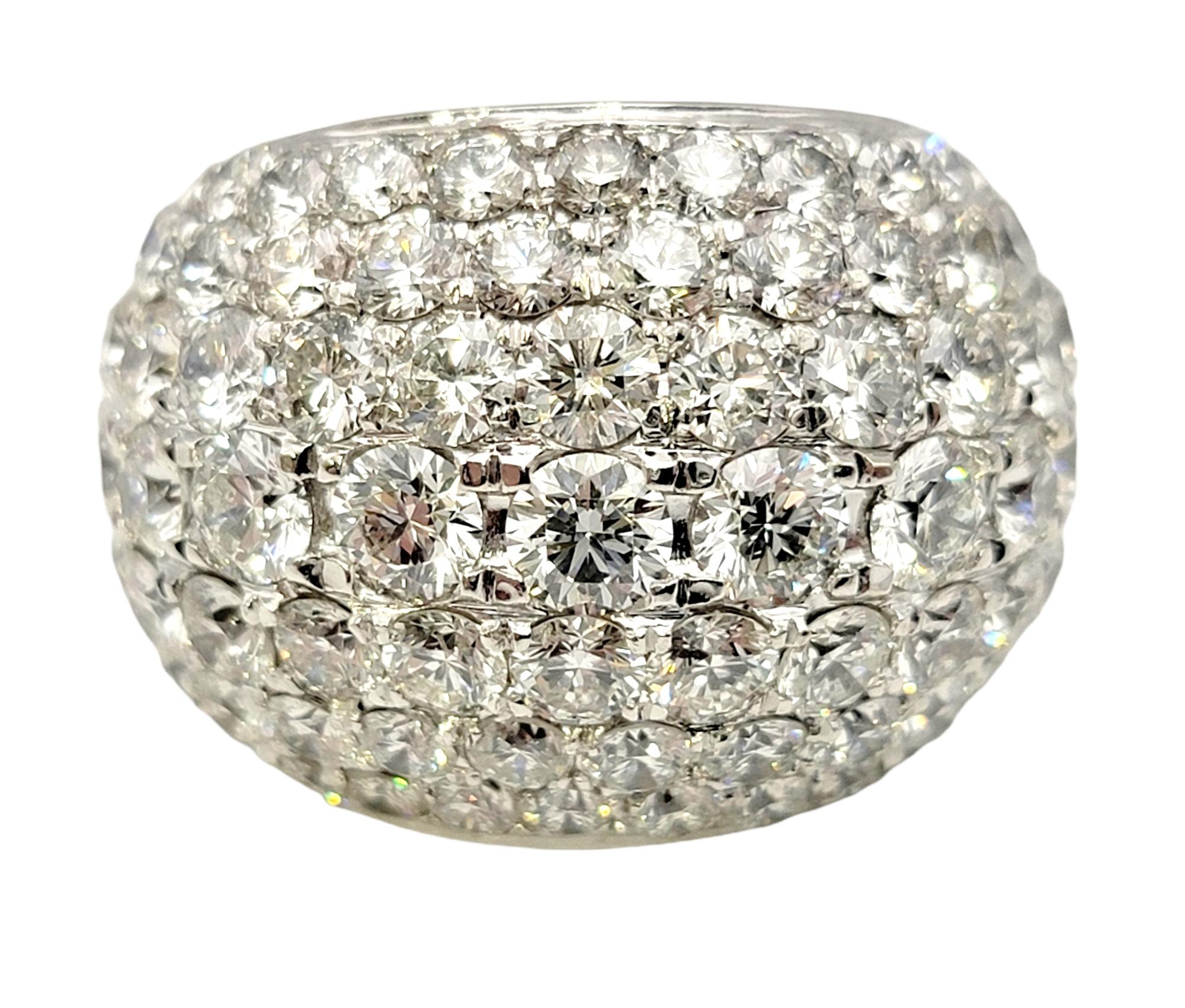 Ring size: 7

You will absolutely fall head over heels in love with this stunningly sparkly diamond dome ring. An impressive 9.00 carats of incredible bright white natural diamonds fill this extraordinary piece from end to end, forming an elegant