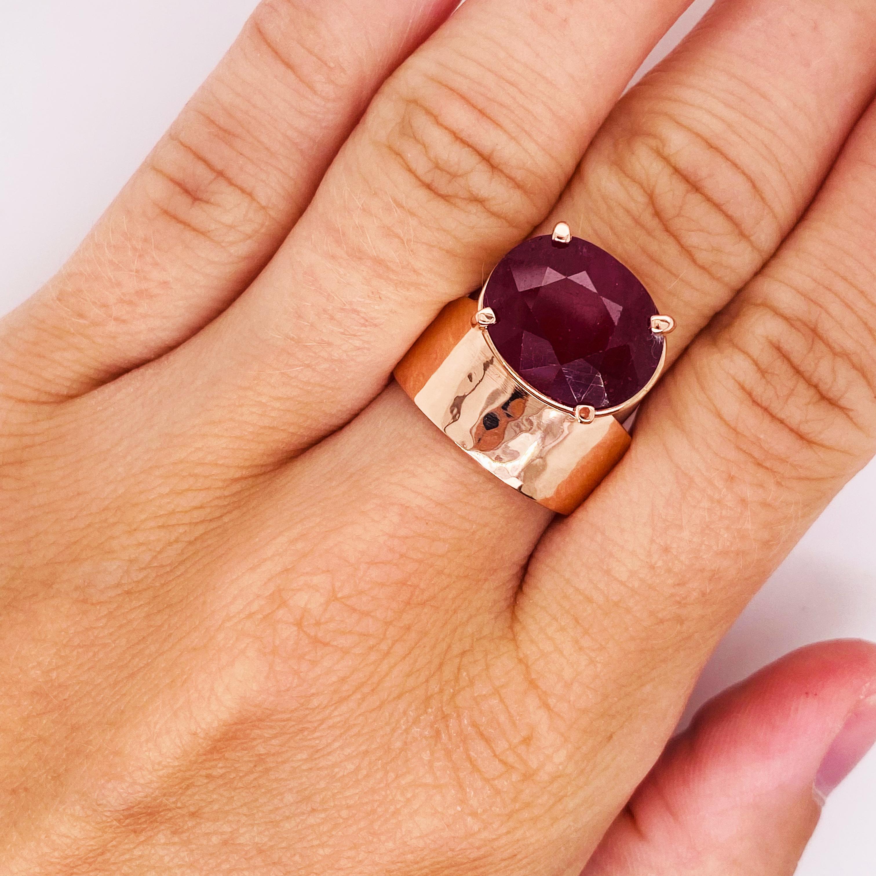 Huge Ruby-12.26 carats is the centerpiece of this beautiful 14 karat rose gold ring! Mary Rupert designed this ring to be unique and different! The pink of the 14k rose gold is perfect with the red of the ruby. Mary Rupert is a Graduate Gemologist