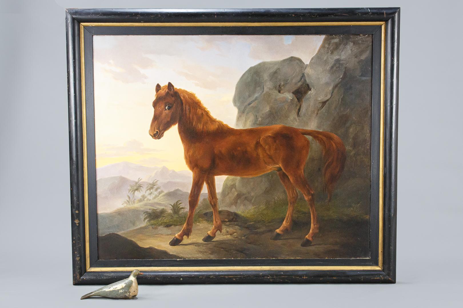 Vast scale oil on canvas painting of a young horse or foal at sunset in a countryside setting. The painting itself has had restoration over the years and is in good condition, the frame is original to the painting and has marks and blemishes