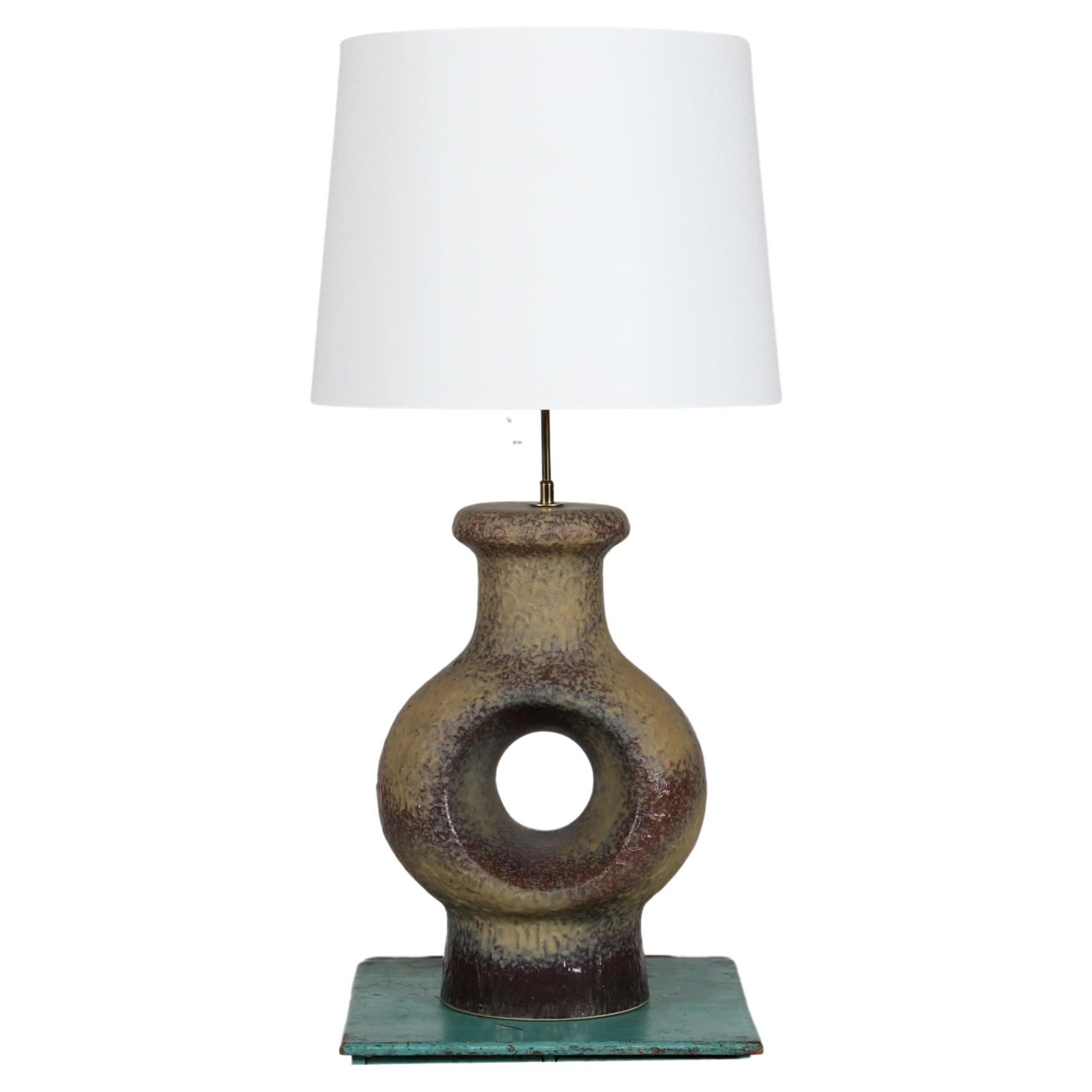 HUGE mid-century brutalist style Danish ceramic table lamp made in the 1970s.

The sculptural lamp base in Sejer Keramik style is made of cast ceramic with glaze in grey colors with a dash of green.

Included is a new lampshade designed in Denmark.