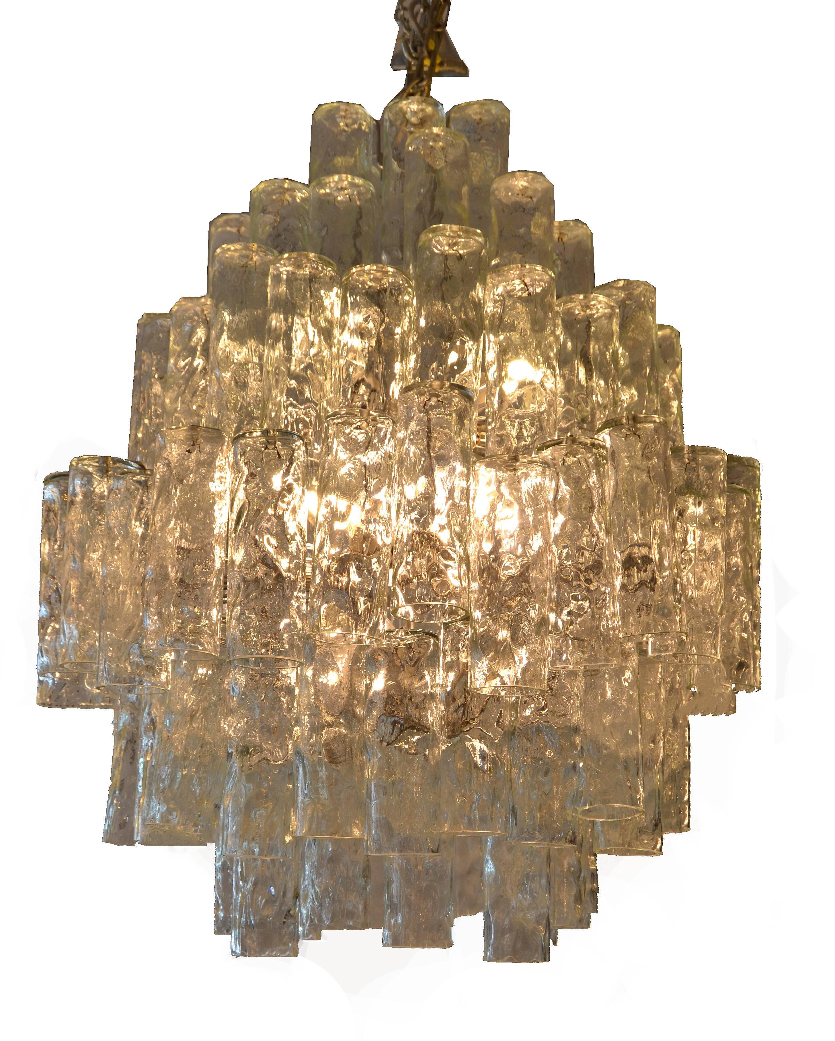 Huge seven-tier Italian crystal and chrome chandelier.
Each crystal shade is hand blown and heavy.
The chandelier comes with a long chain and canopy which can be adjusted to your desired height.
It is in perfect working condition and uses 40 w light