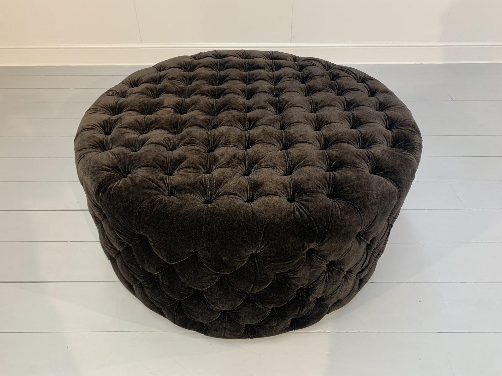 This is the most spectacular, unused Bespoke “Soho Buttoned-Drum” Ottoman/Footstool, dressed in a breathtaking, peerless, top-grade, Italian-Velvet Fabric in an elegant, flexible Dark-Grey.

In particular, this bespoke commission was created by a