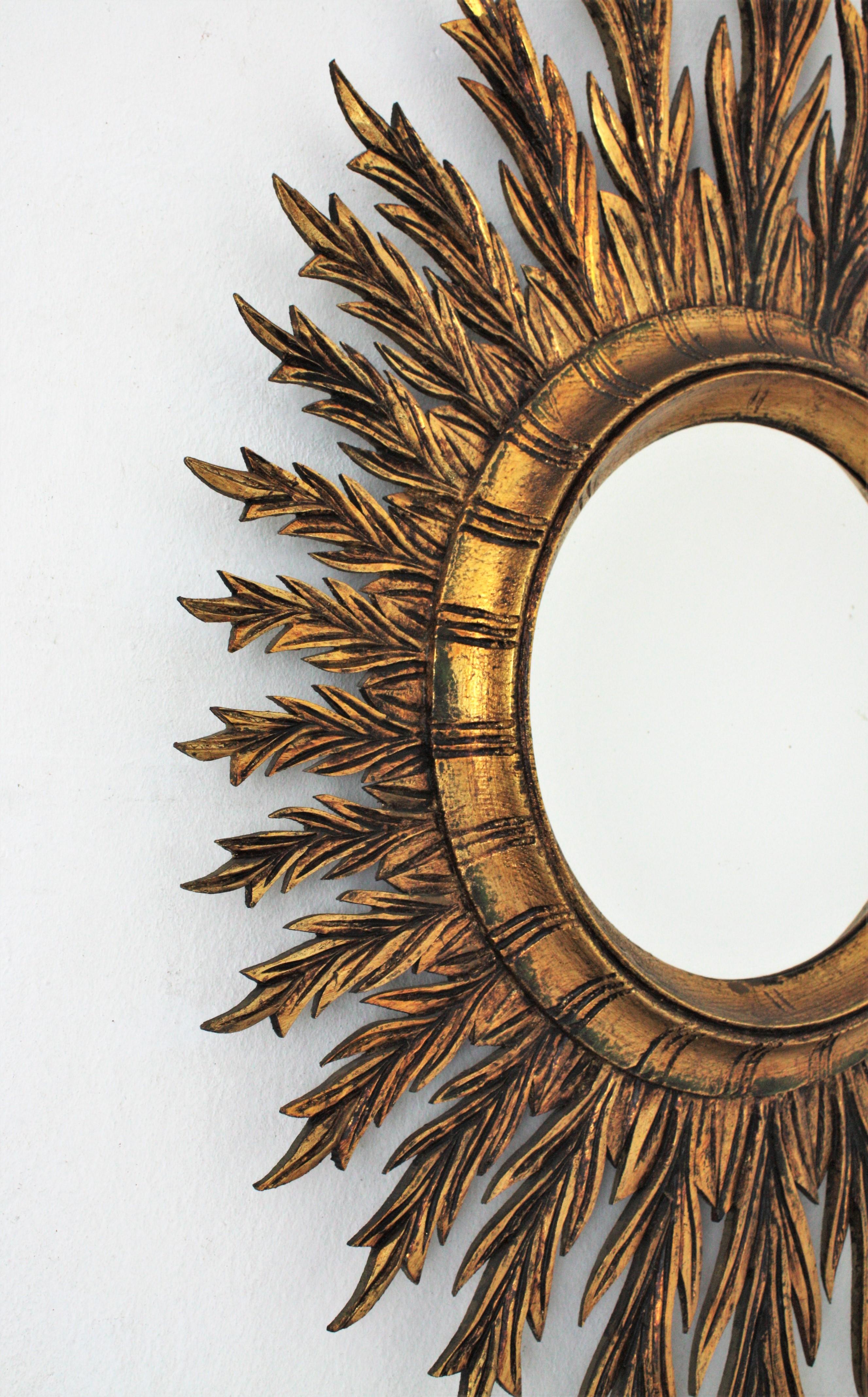 Mid-Century Spanish Oval Sunburst Mirror in Carved Giltwood 3