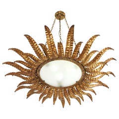 Huge Spanish Sunburst Foliage Pendant Light Fixture in Gilt Iron, 1950s