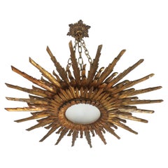 Huge Sunburst Pendant Light Fixture in Carved Giltwood, Spain 1940s, 90 cm