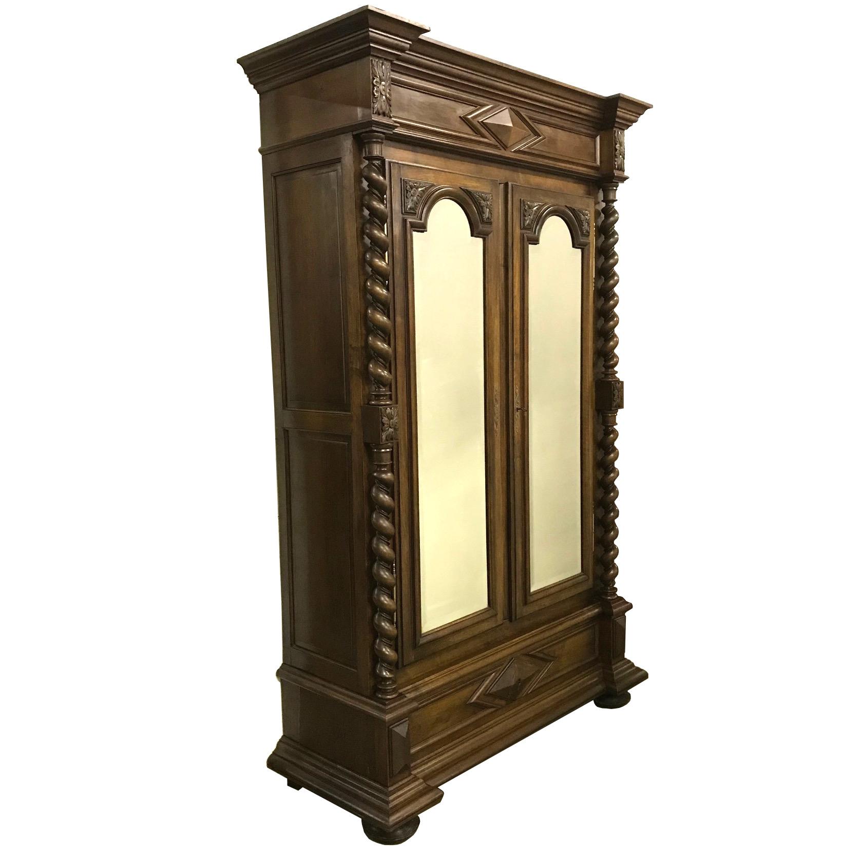 This amazing large antique wardrobe hails from France. Crafted there sometime around the year 1880, it houses a huge area for all your clothing storage needs or would make a good bookcase if you cut shelves for the inside. A large drawer on the