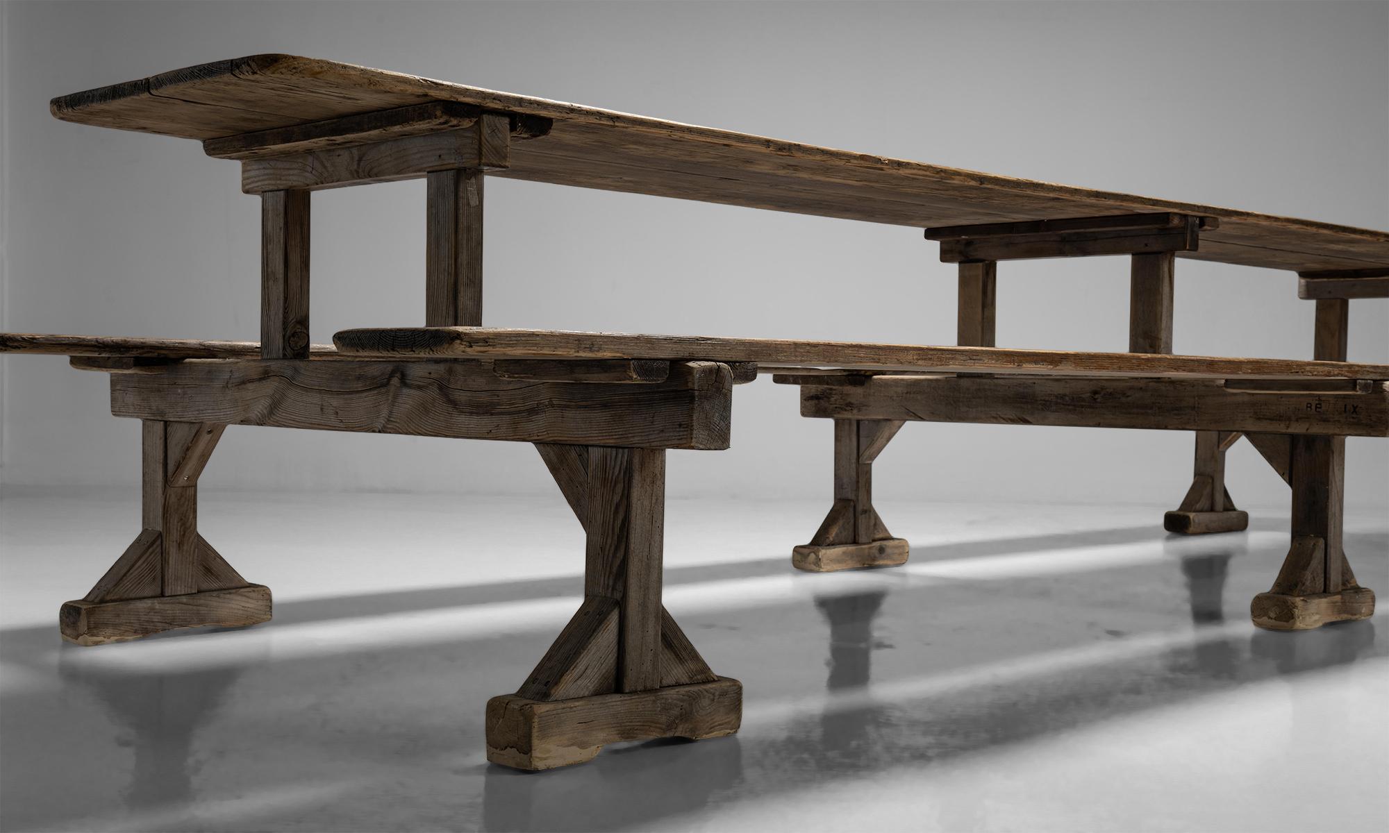 Huge trestle table with benches

France Circa 1900

Three Stand alone pine trestles with plank pine table top and benches.

Measures: 157.5”W x 53”D x 31”H.