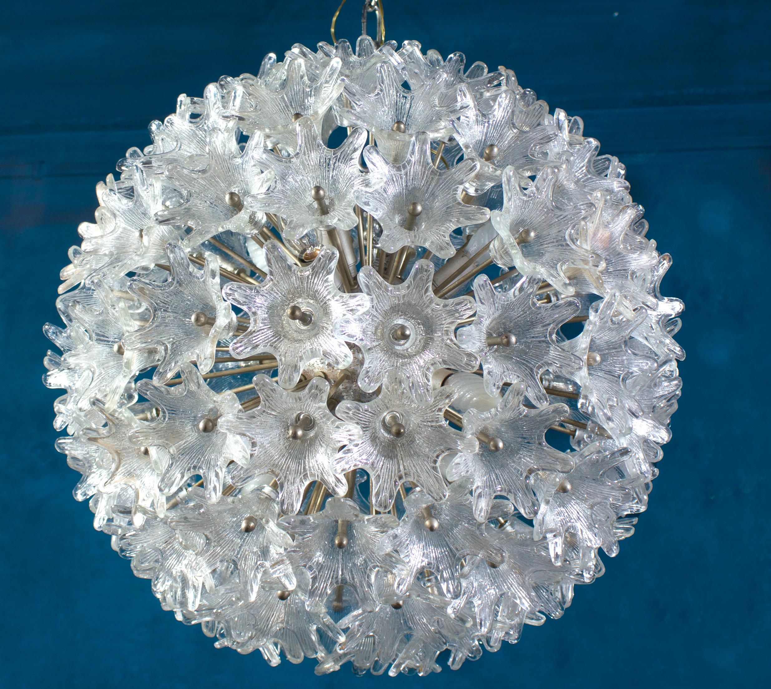 Sputnik flower Murano glass chandelier by Paolo Venini for VeArt, Italy. Covered in molded ice structure glass flower on a chrome Sputnik frame. 
A beautiful clear natural look like a jewel in your living room. In good original condition with minor