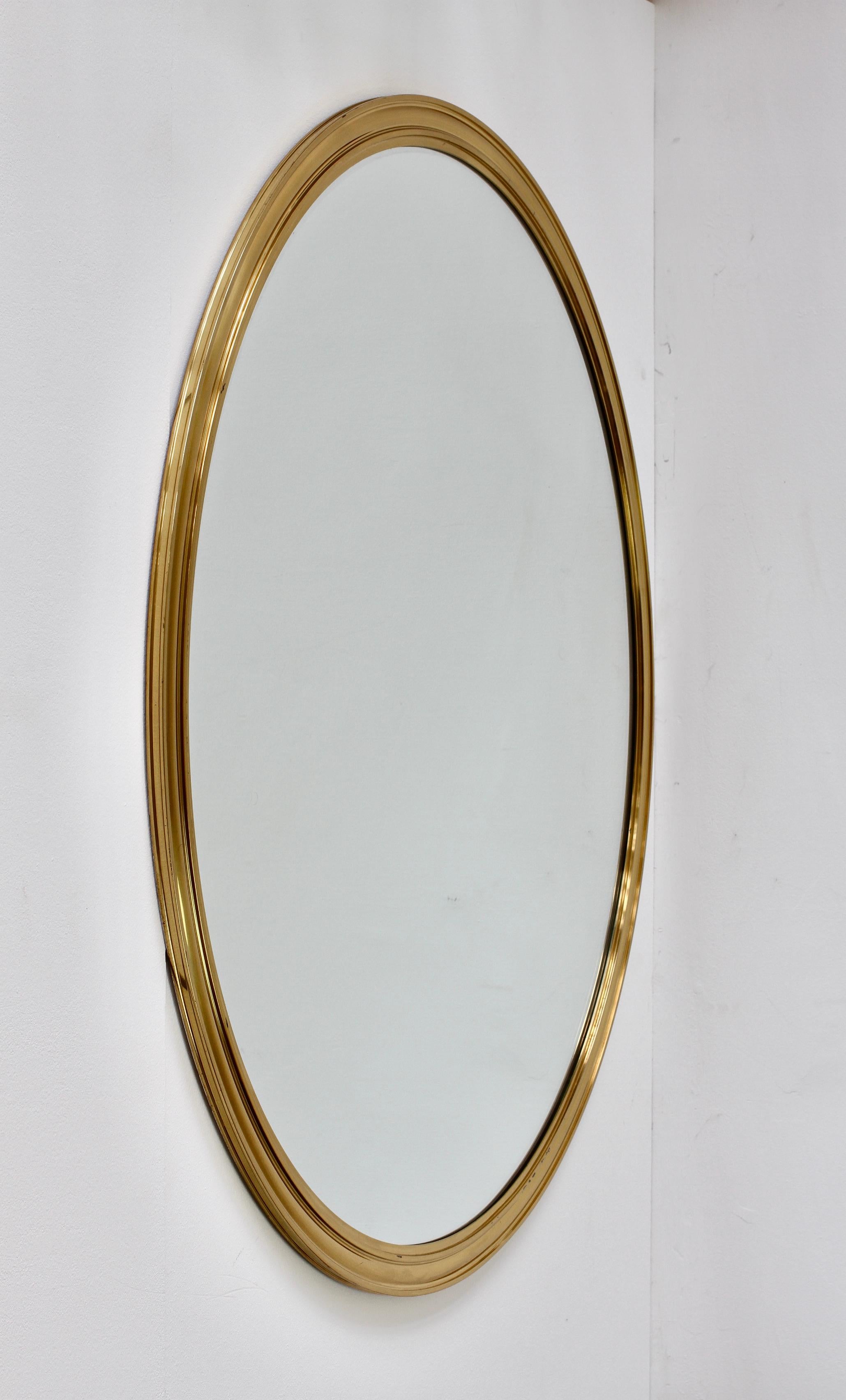 Mid-Century Modern Huge Vereinigte Werkstätten München Wall Mounted Polished Brass Mirror c. 1955 For Sale