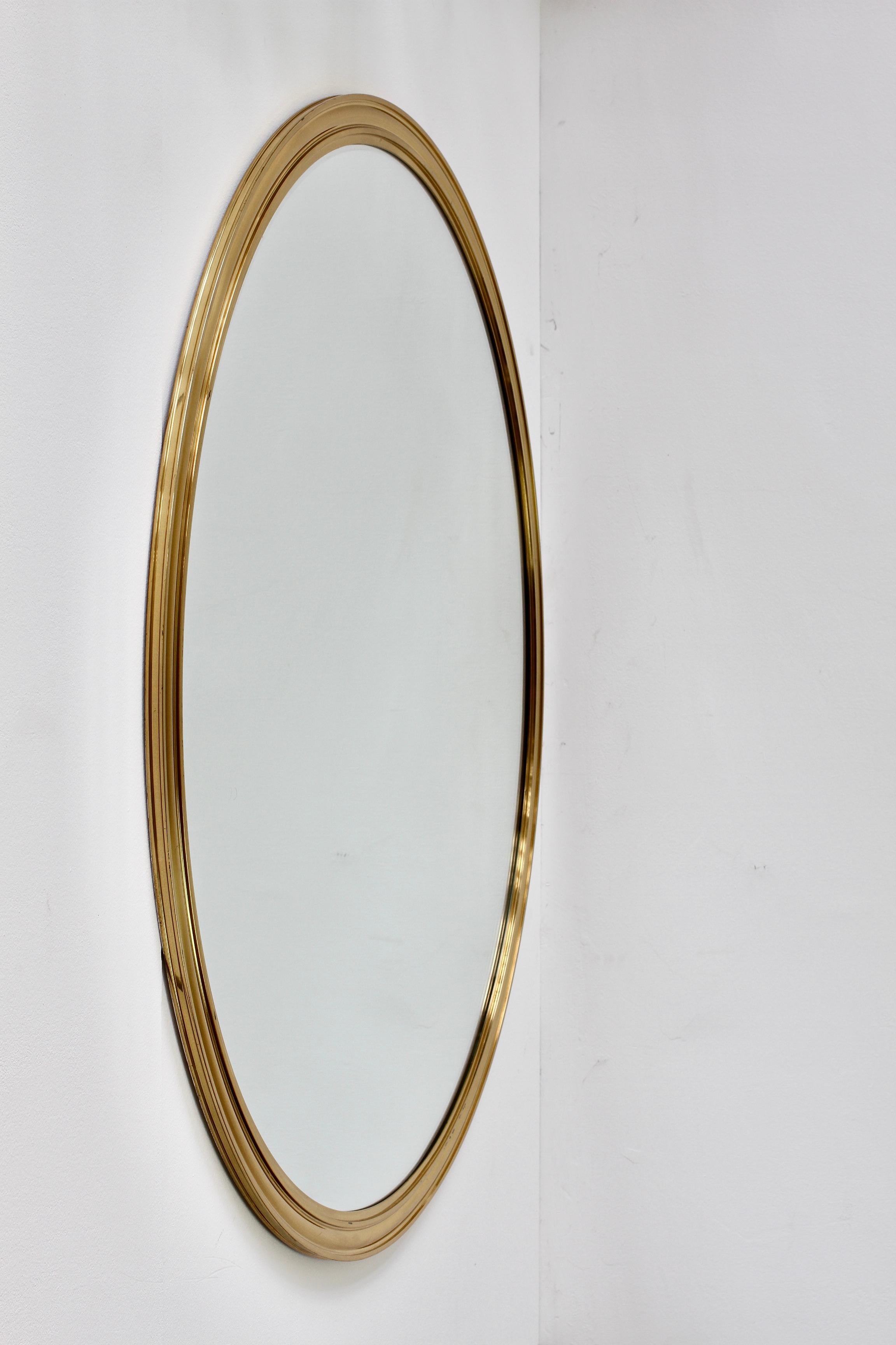 German Huge Vereinigte Werkstätten München Wall Mounted Polished Brass Mirror c. 1955 For Sale