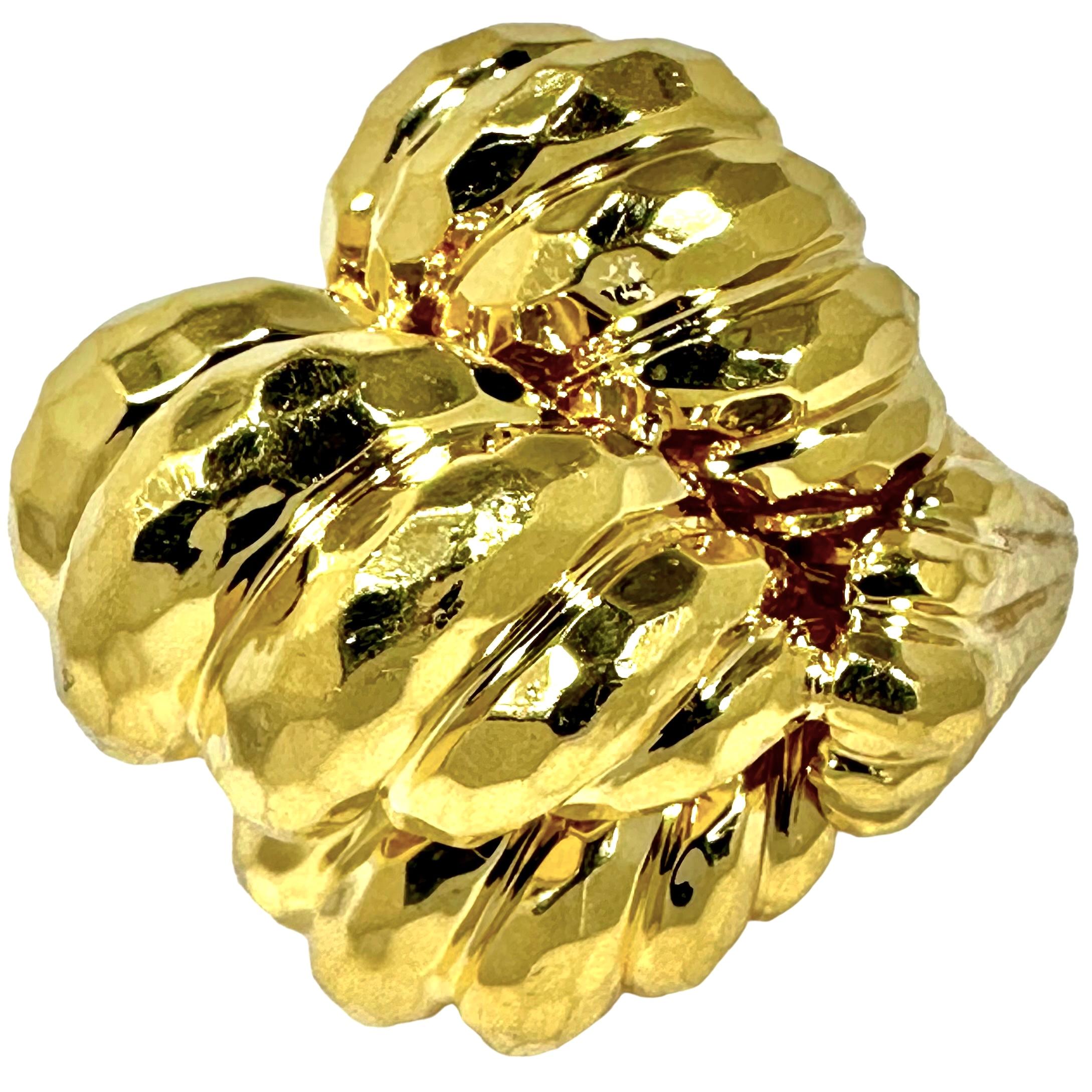 This amazing vintage Henry Dunay 18k yellow gold hammered torsade style dome ring measures a full 1 3/8 by 1 1/4 inches, and rises to a full 1 inch above the finger when worn. This undoubtedly is among the largest and best executed examples of this