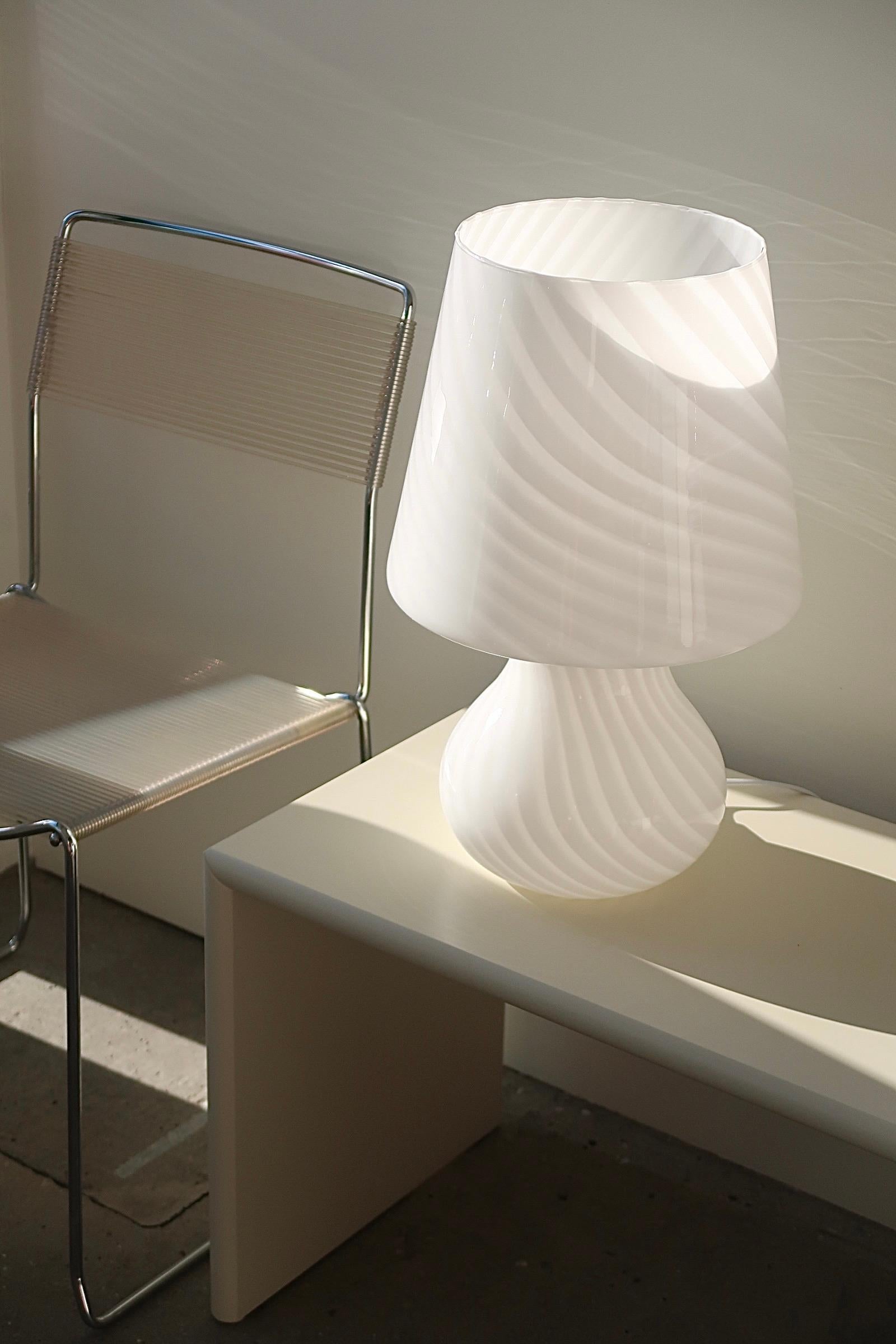 Vintage Murano extra large white mushroom table lamp with swirl pattern. The lamp has a double light source - this means that there is both a bulb in the lower and upper part of the lamp. Mouth blown in one piece of glass and has a beautiful swirl.