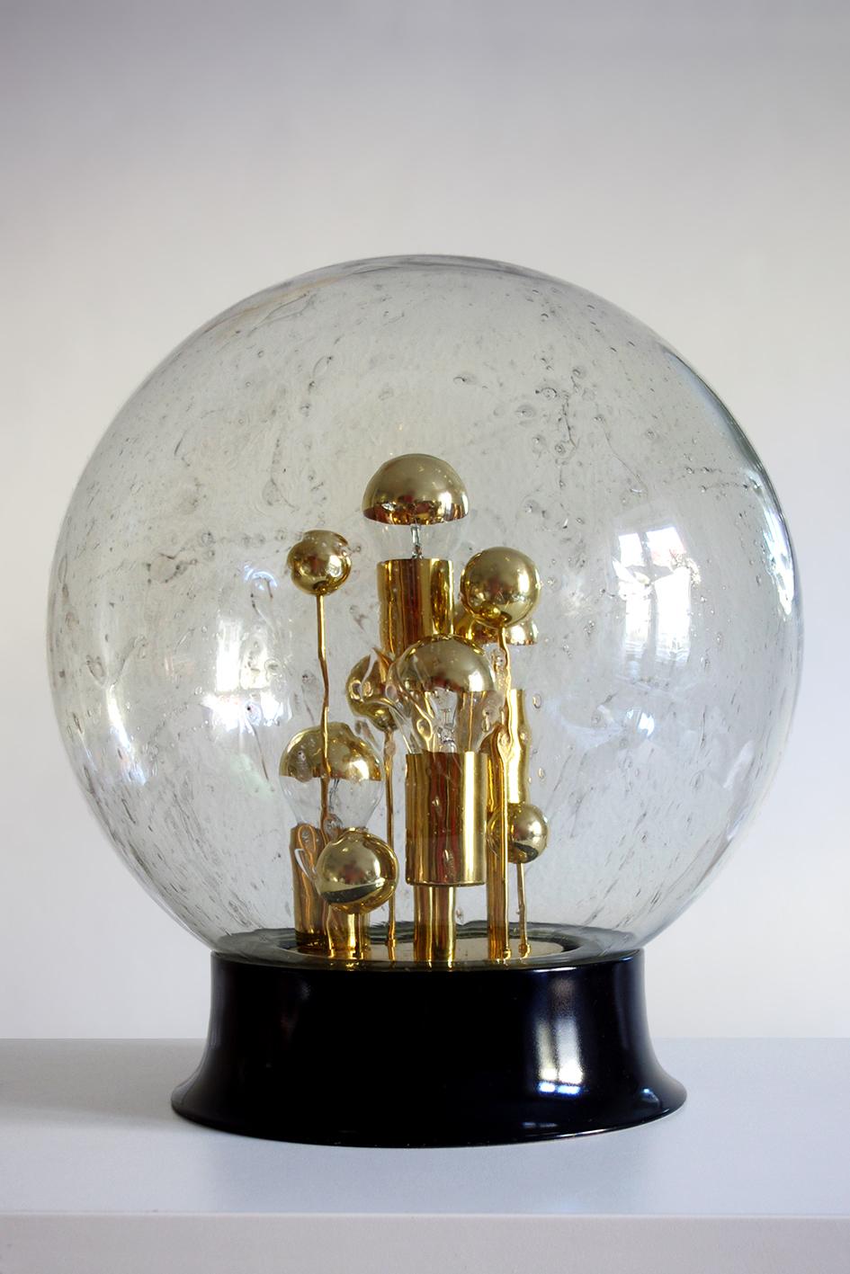 Beautiful handblown bubble glass globe and gold - black metal light.
Germany, 1970s.
Lamp sockets.
 