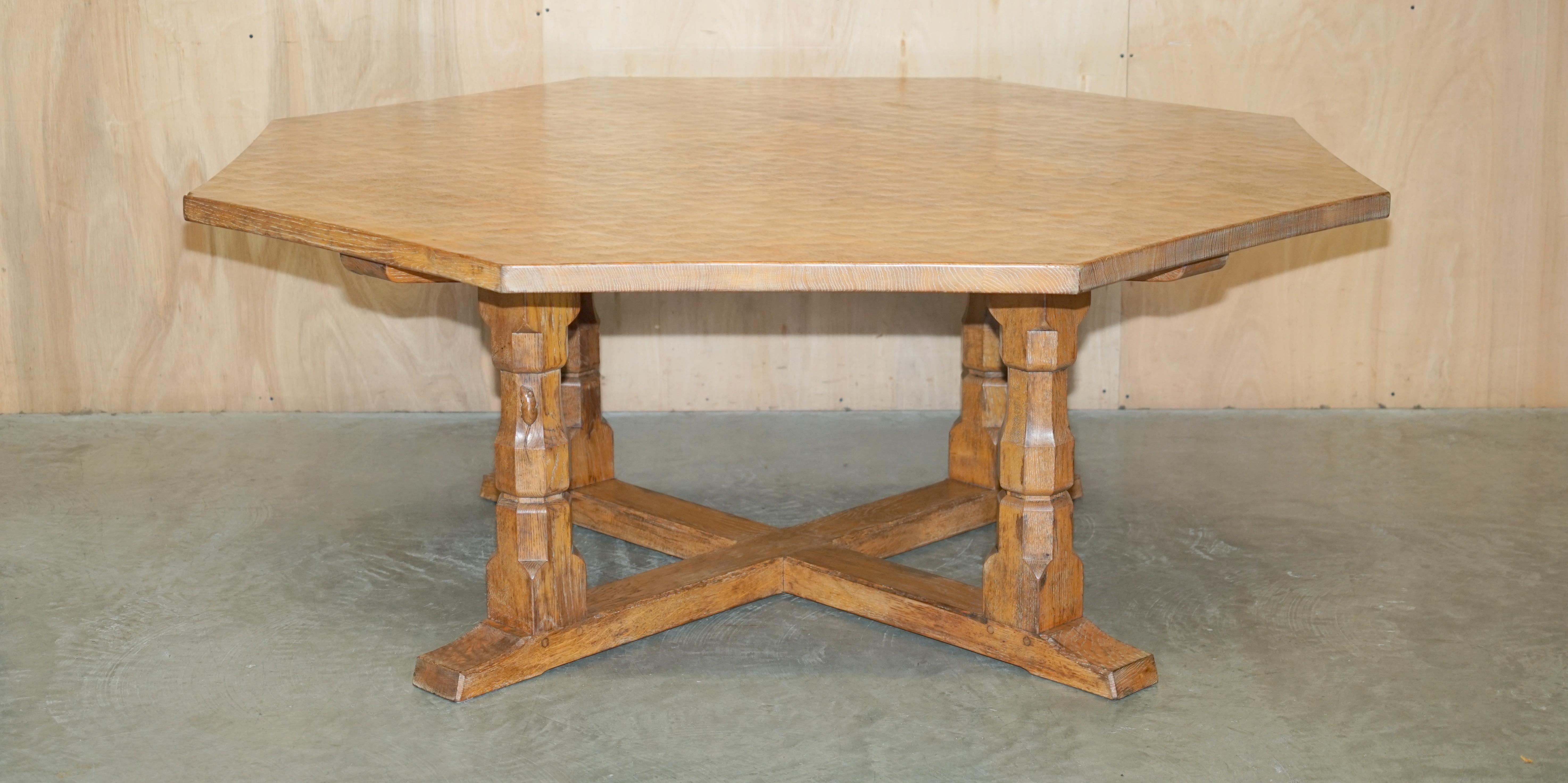 Royal House Antiques

Royal House Antiques is delighted to offer for sale this very collectable, huge, circa 1950's Robert Mouseman Thompson English oak Octagonal Adzed dining table with sublime patination

Please note the delivery fee listed is